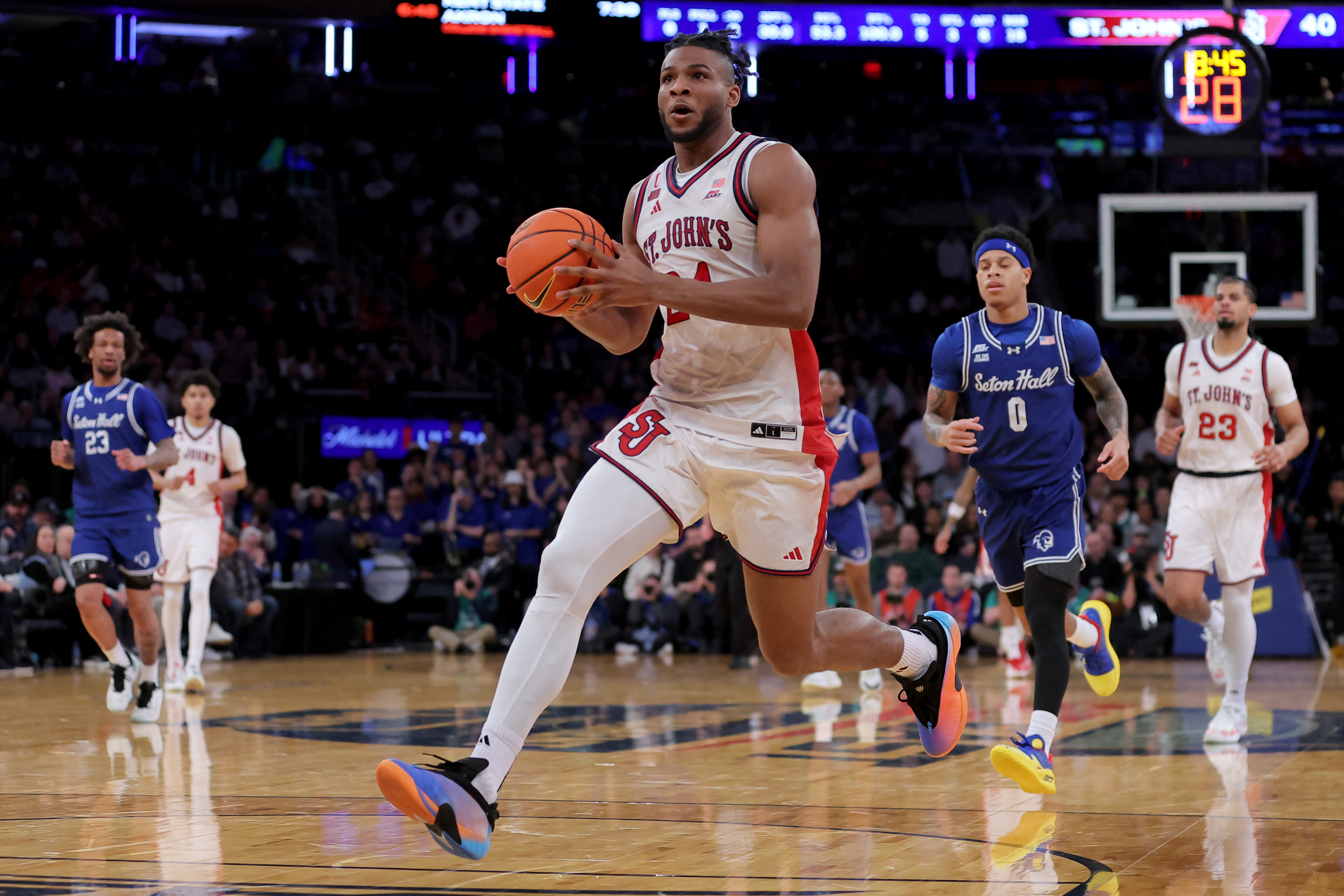 St. John's Red Storm forward Zuby Ejiofor (24) drives to the basket as we break down our Northern Iowa vs. St. John's prediction.