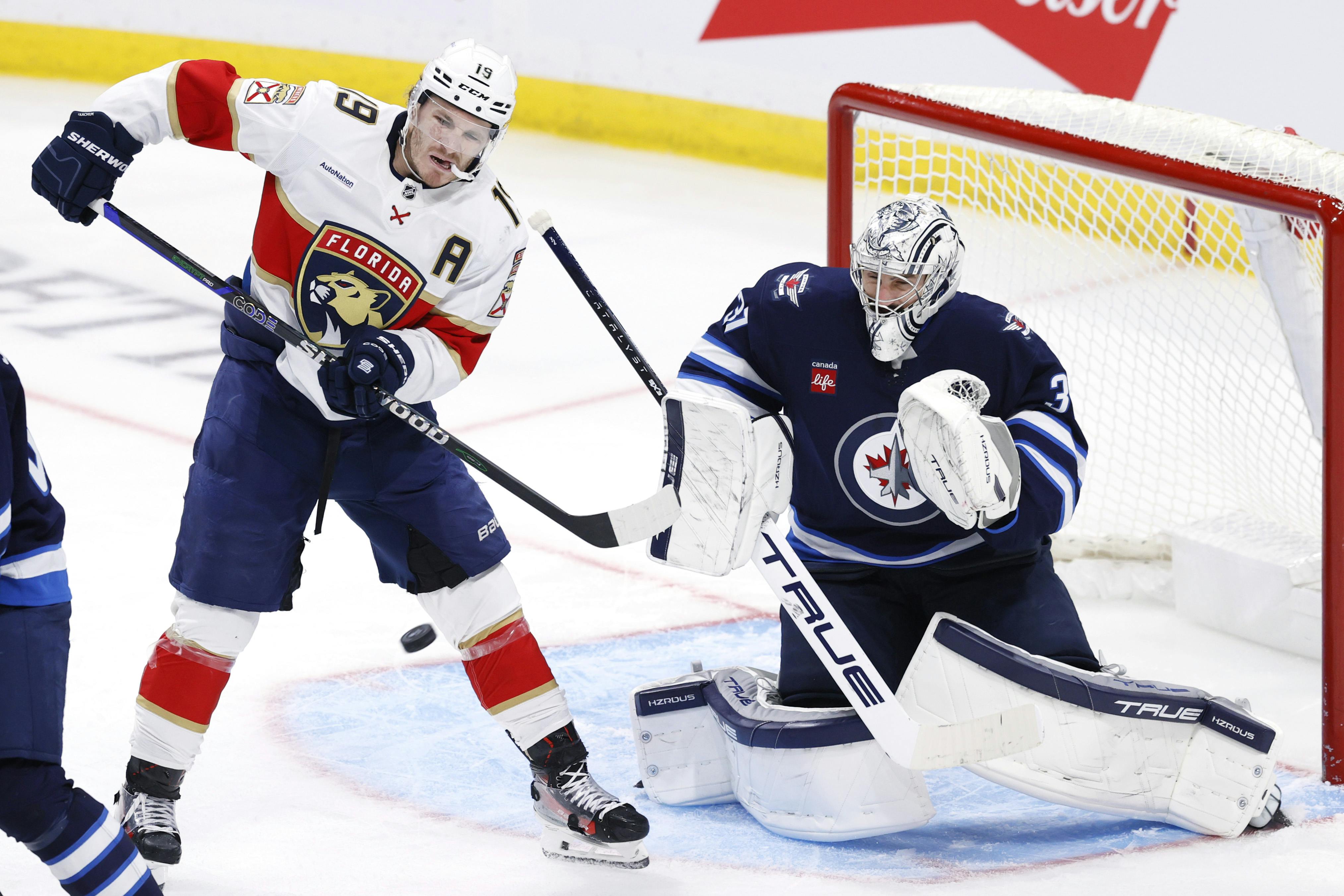 Florida Panthers left wing Matthew Tkachuk tries for a tip in on Winnipeg Jets goaltender Connor Hellebuyck as we analyze the 2024-25 Stanley Cup odds. 