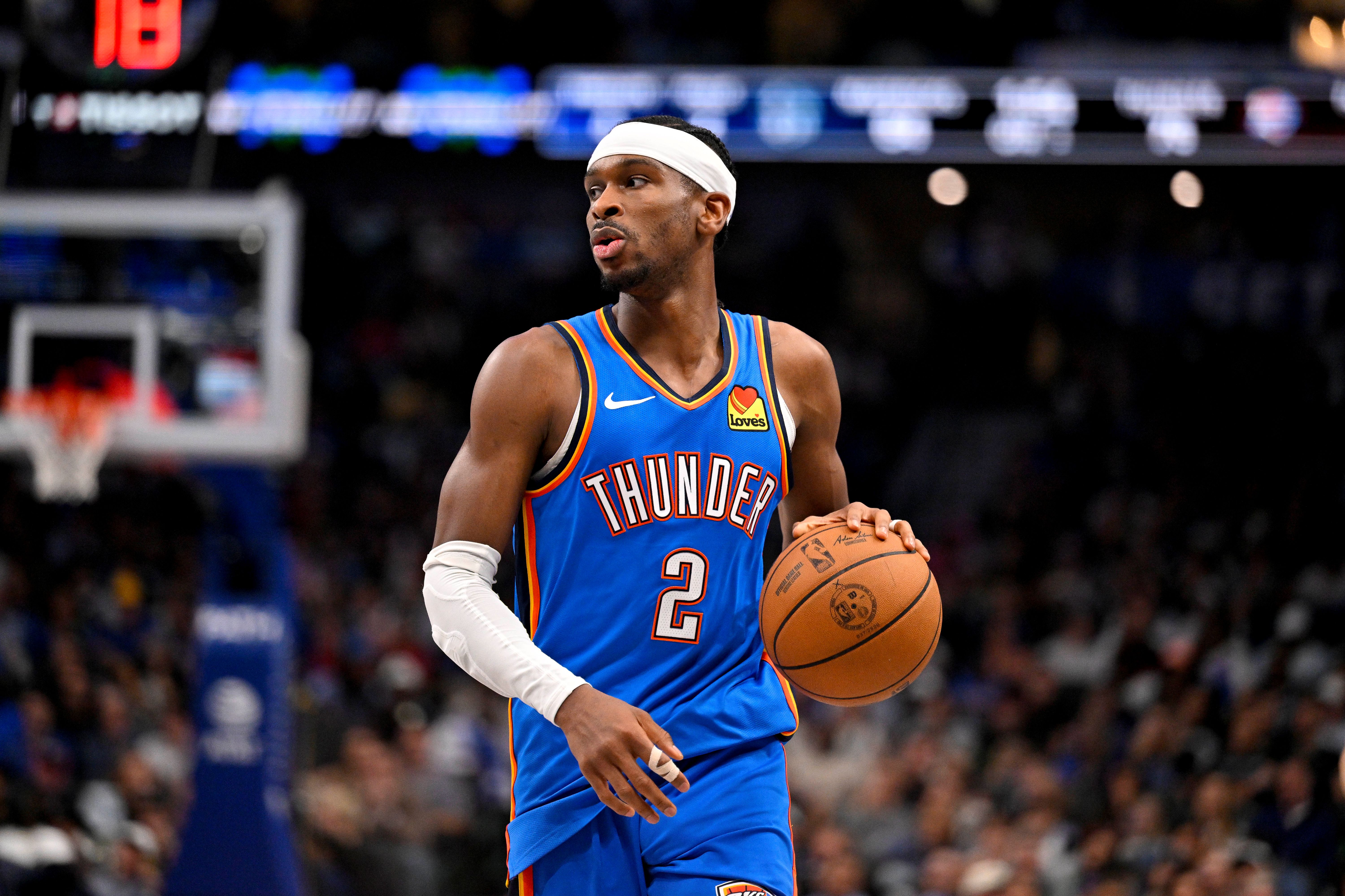 Oklahoma City Thunder guard Shai Gilgeous-Alexander (2), seen here controlling the ball, is featured in our Celtics vs. Thunder player props tonight.