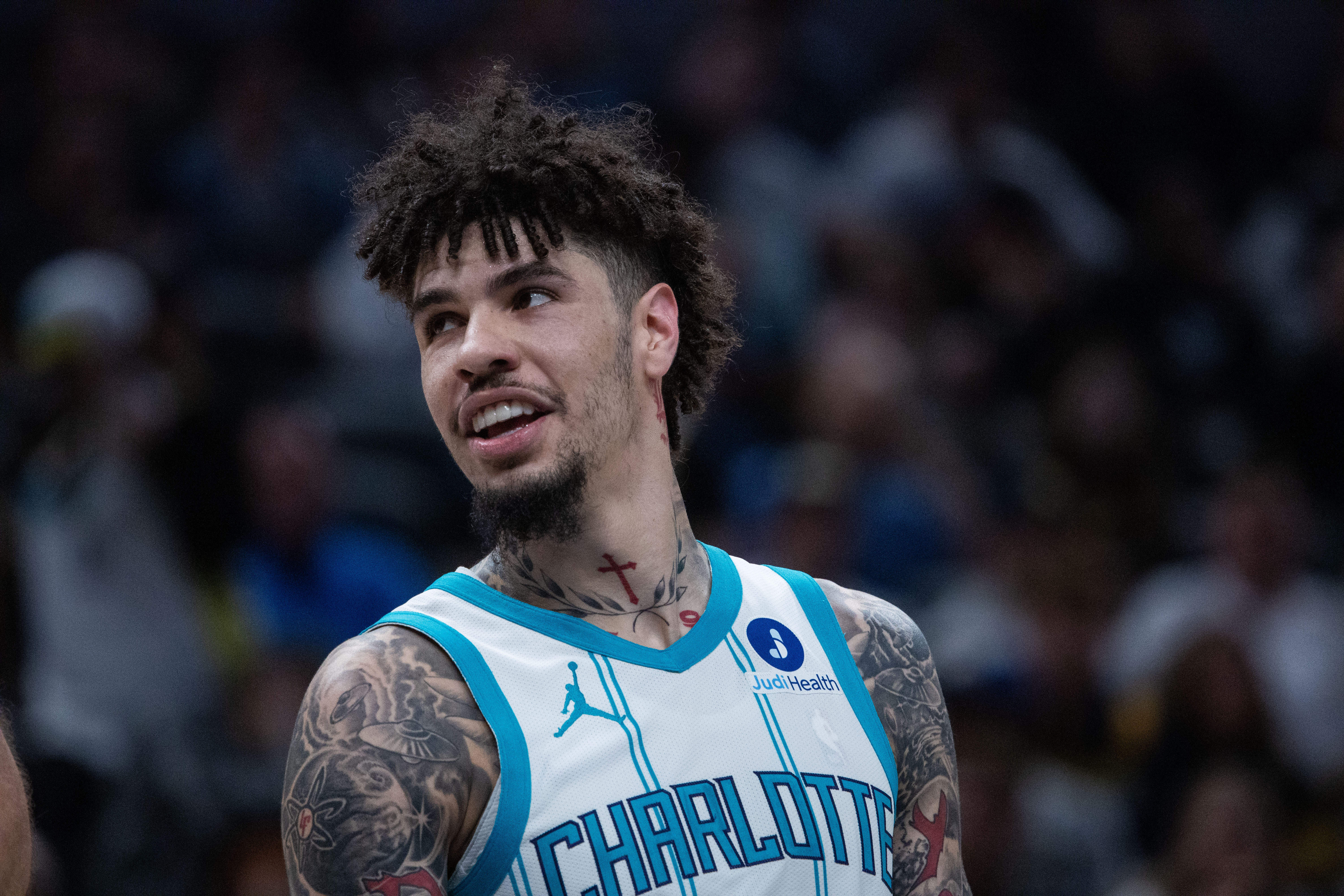 Charlotte Hornets guard LaMelo Ball (1) looks on as we dive into our best NBA player props tonight.