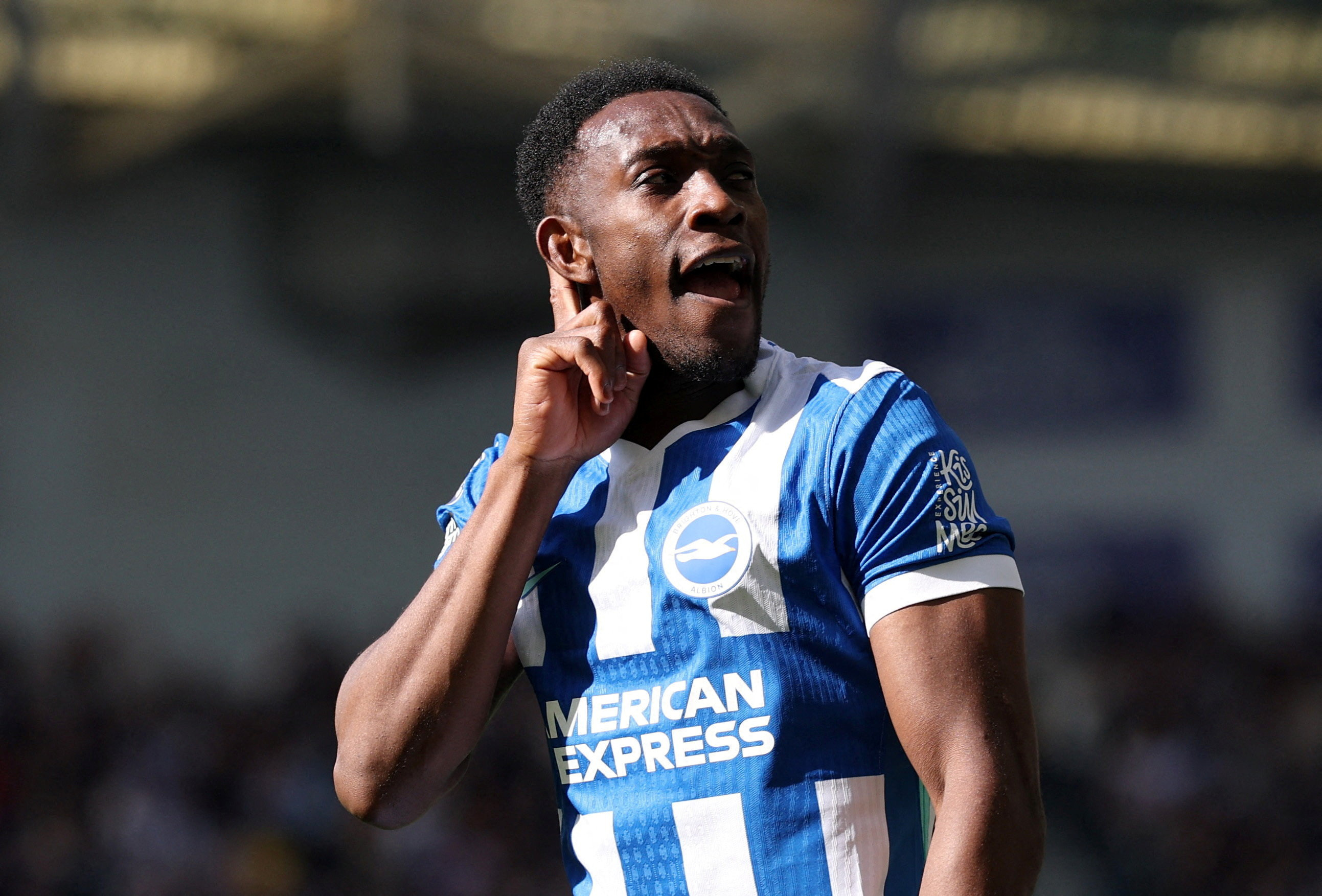 Brighton & Hove Albion's Danny Welbeck celebrates scoring as we make our best Tottenham vs. Brighton prediction.