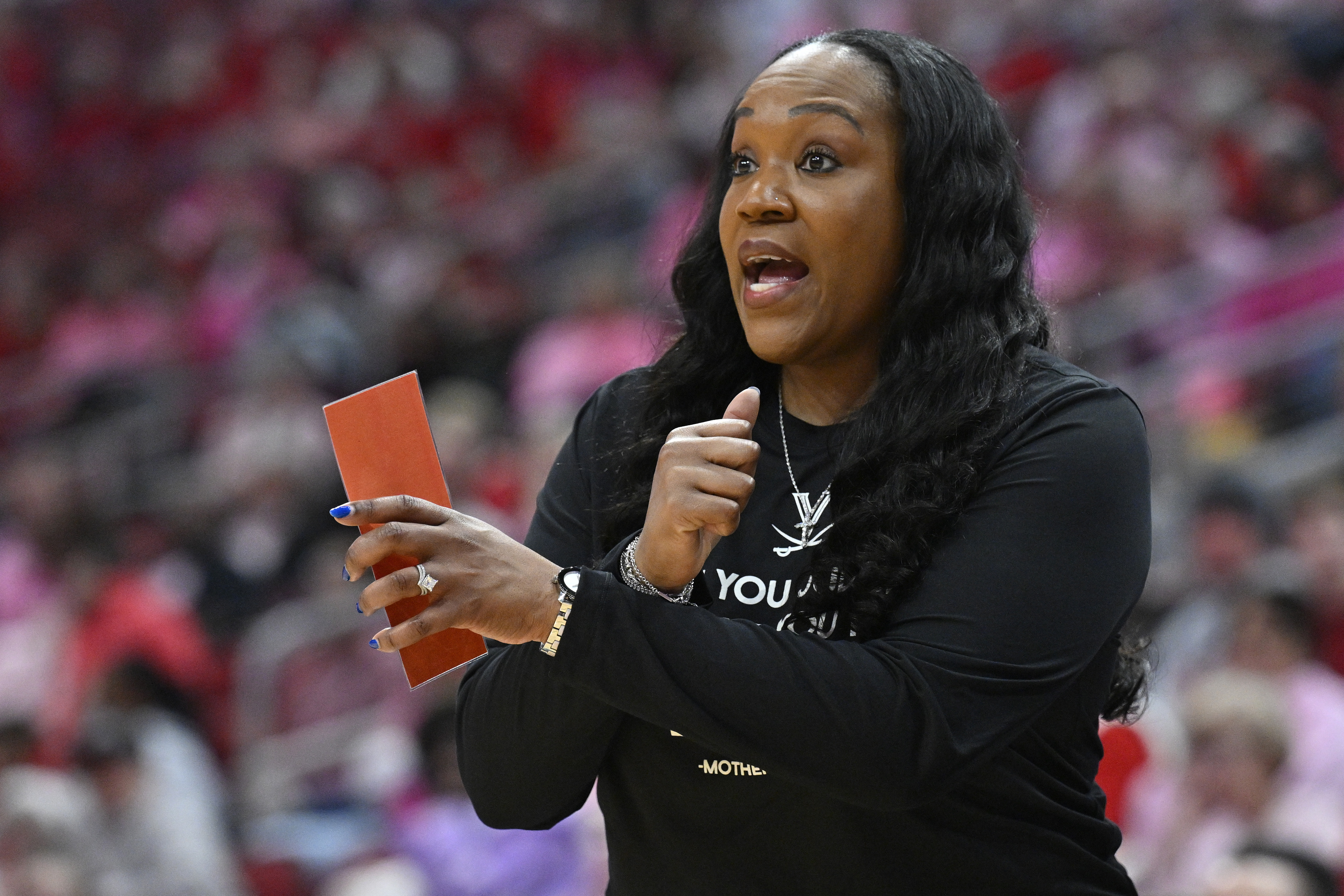 Virginia Cavaliers head coach Amaka Agugua-Hamilton calls out instructions as we break down our Arizona State vs. Virginia prediction & picks.