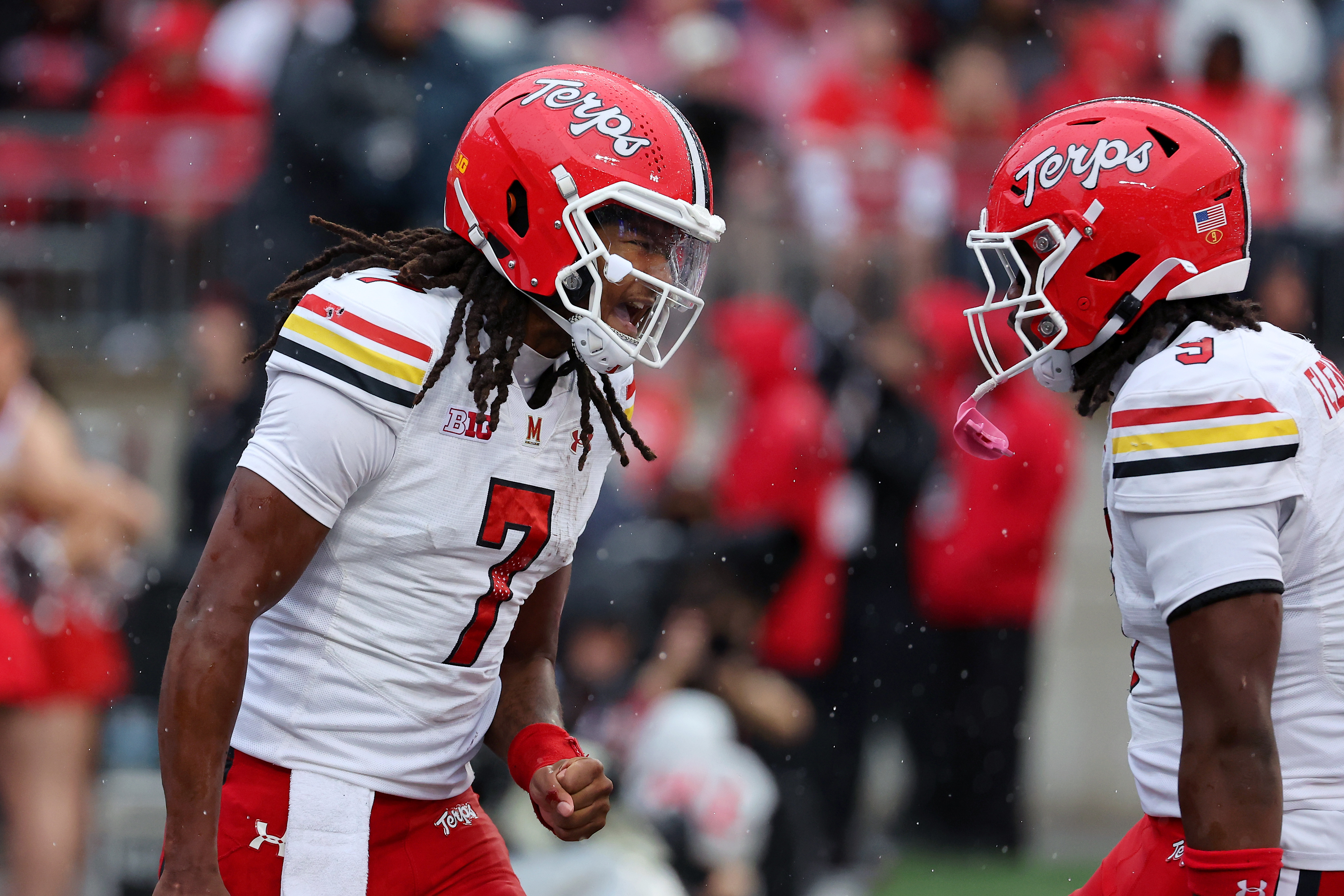 Maryland Terrapins quarterback Malik Washington (7) celebrates scoring a touchdown as we make our best Week 9 college football moneyline prediction. 