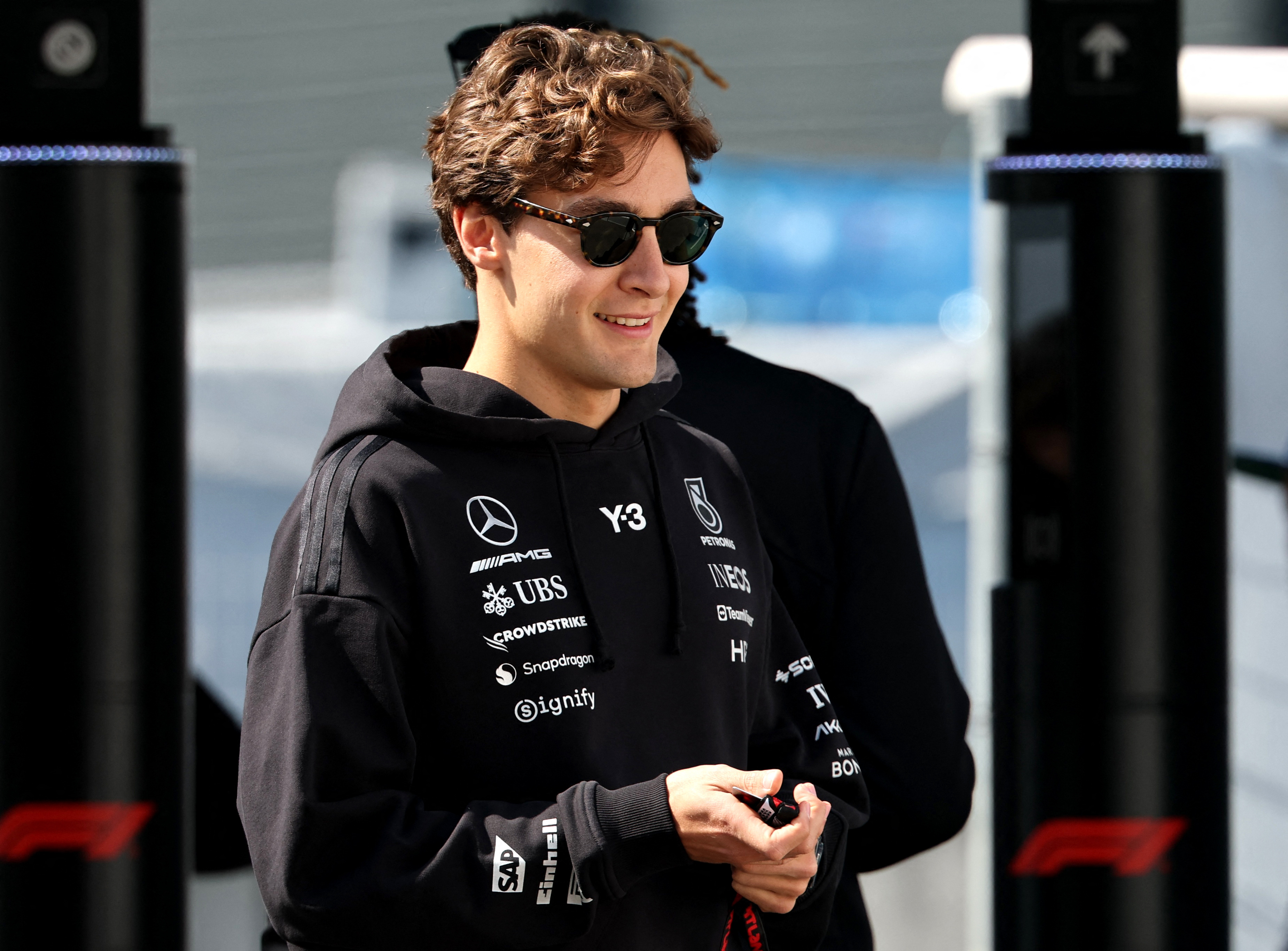 George Russell near the paddock as we offer our Japanese Grand Prix odds and favorites. 