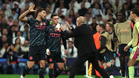 Manchester City's English midfielder #47 Phil Foden (C) celebrates with teammates as we make our best Manchester City vs. Real Madrid predictions for the second leg of their Champions League quarterfinal at the Etihad Stadium. 