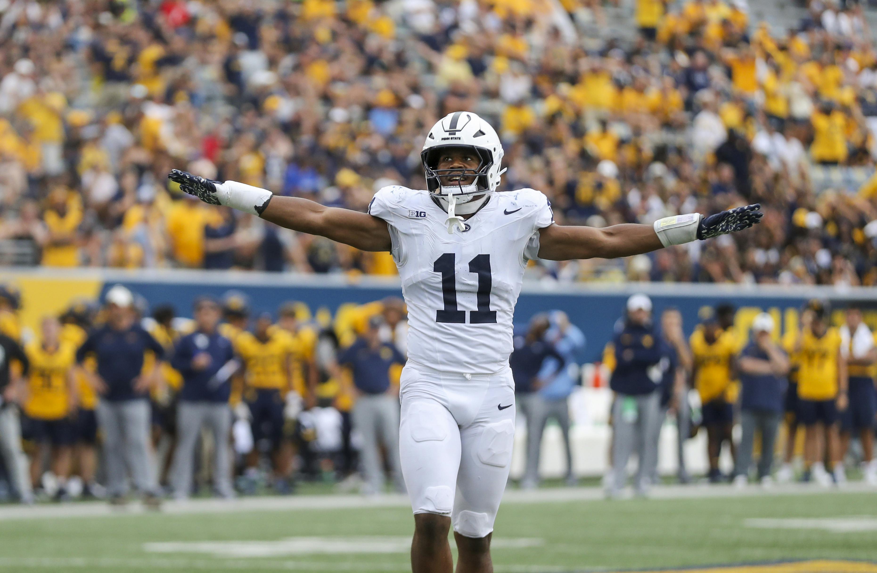 Penn State defensive end Abdul Carter celebrates after a defensive stop against West Virginia. Carter is among the favorites to go No. 1 by the 2025 NFL Draft odds.