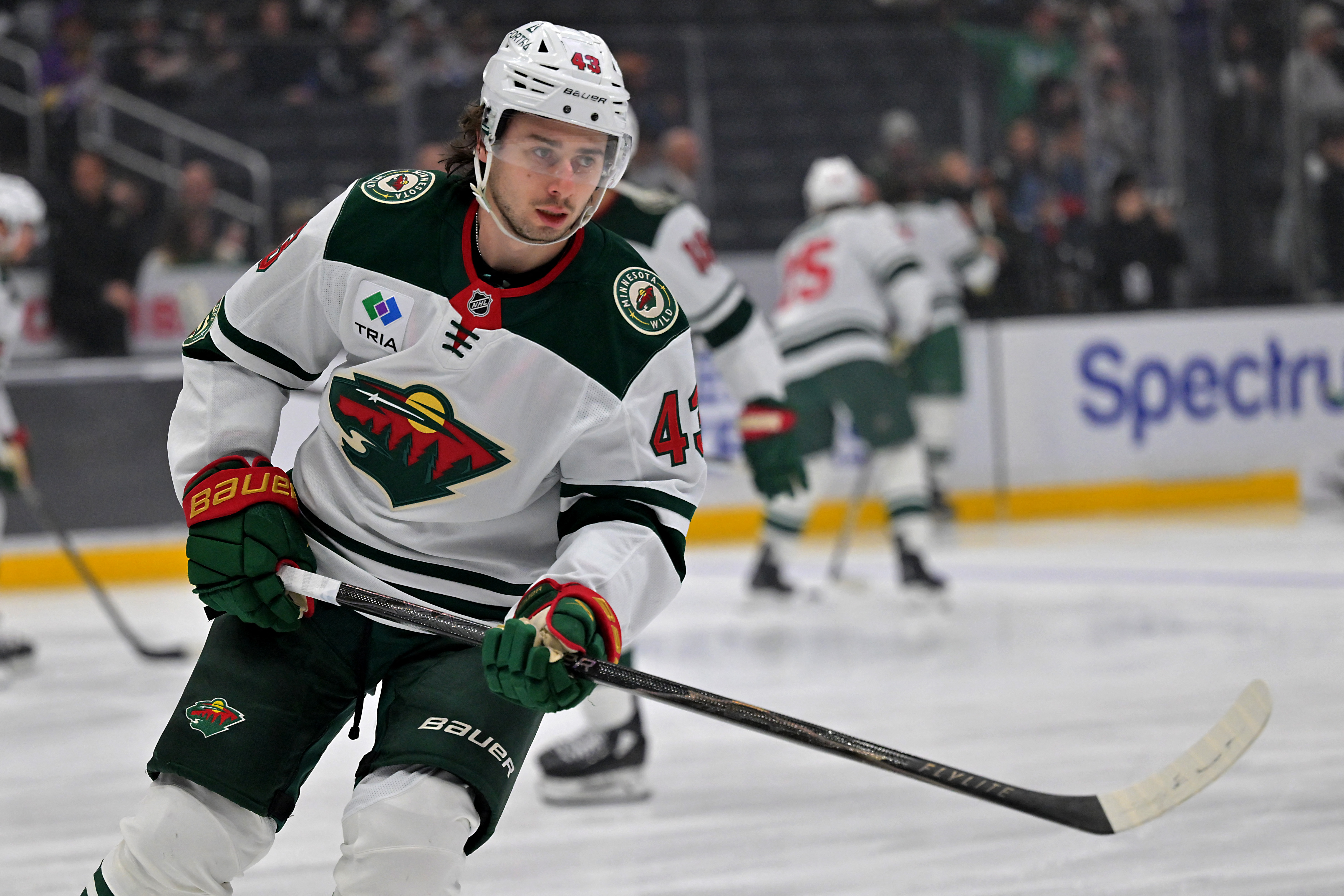 Minnesota Wild defenseman Quinn Hughes (43), seen here warming up prior to a game, is featured in our Wild vs. Stars prediction for Game 2 tonight.