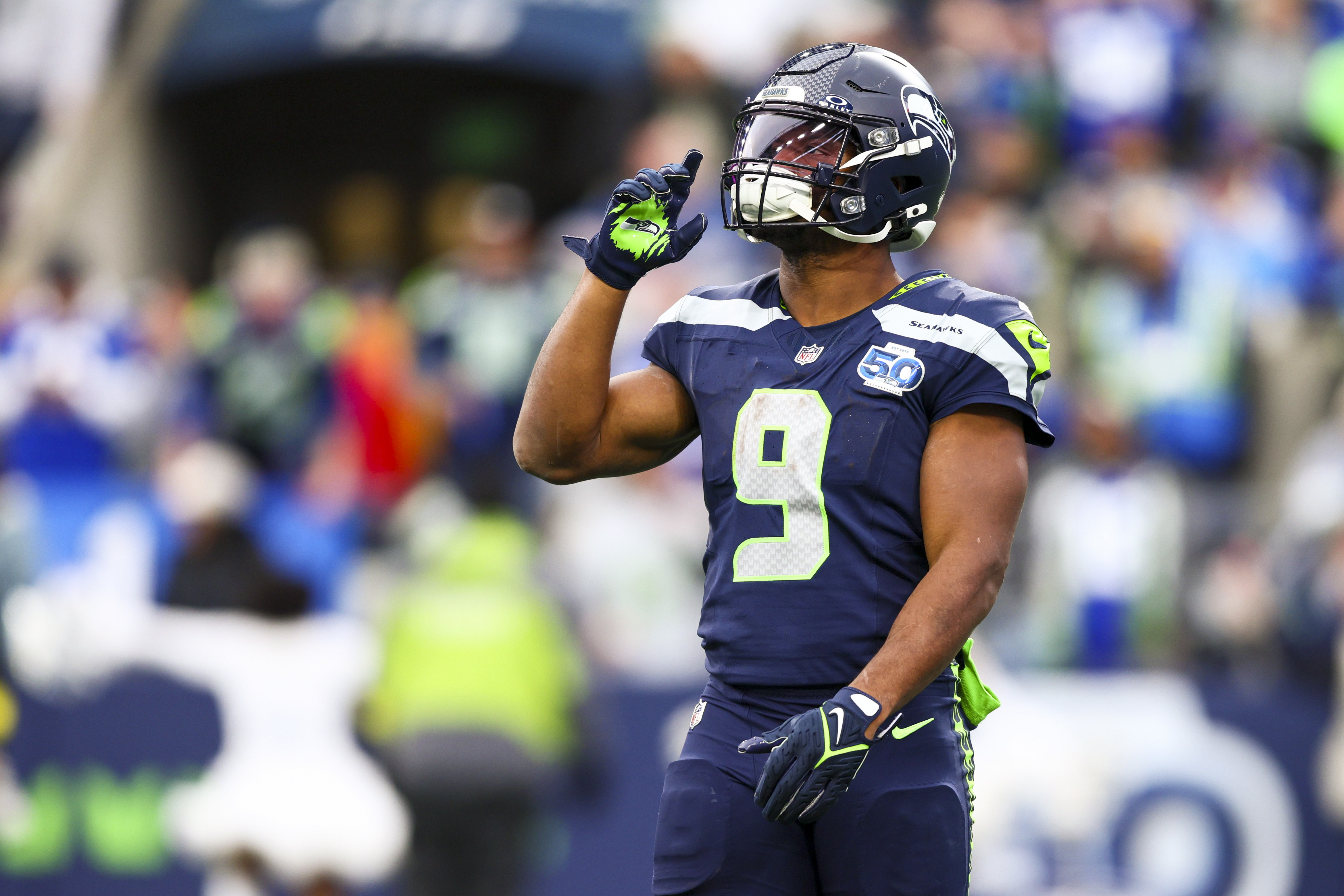 Seattle Seahawks running back Kenneth Walker III reacts to a play as we make our best Rams vs. Seahawks player props