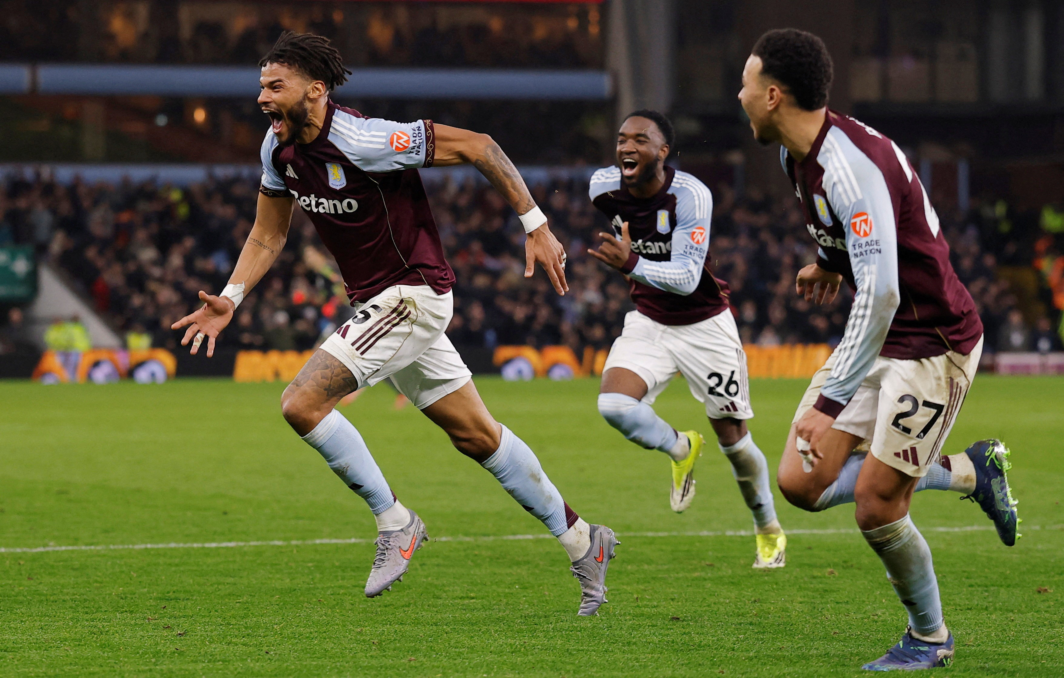 Aston Villa's Tyrone Mings celebrates scoring as we make our best Wolves vs. Aston Villa prediction