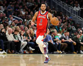 CJ McCollum of the New Orleans Pelicans handles the ball during a game against the Milwaukee Bucks at Fiserv Forum as we look at our Thunder-Pelicans Game 3 player props and expert picks based on the best NBA odds.