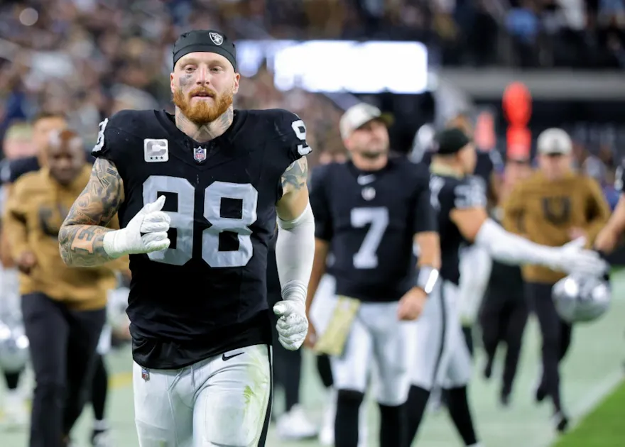Defensive end Maxx Crosby of the Las Vegas Raiders runs off the field at halftime of a game against the New York Jets, and we offer our top defensive player props for Week 11 based on the best NFL odds.