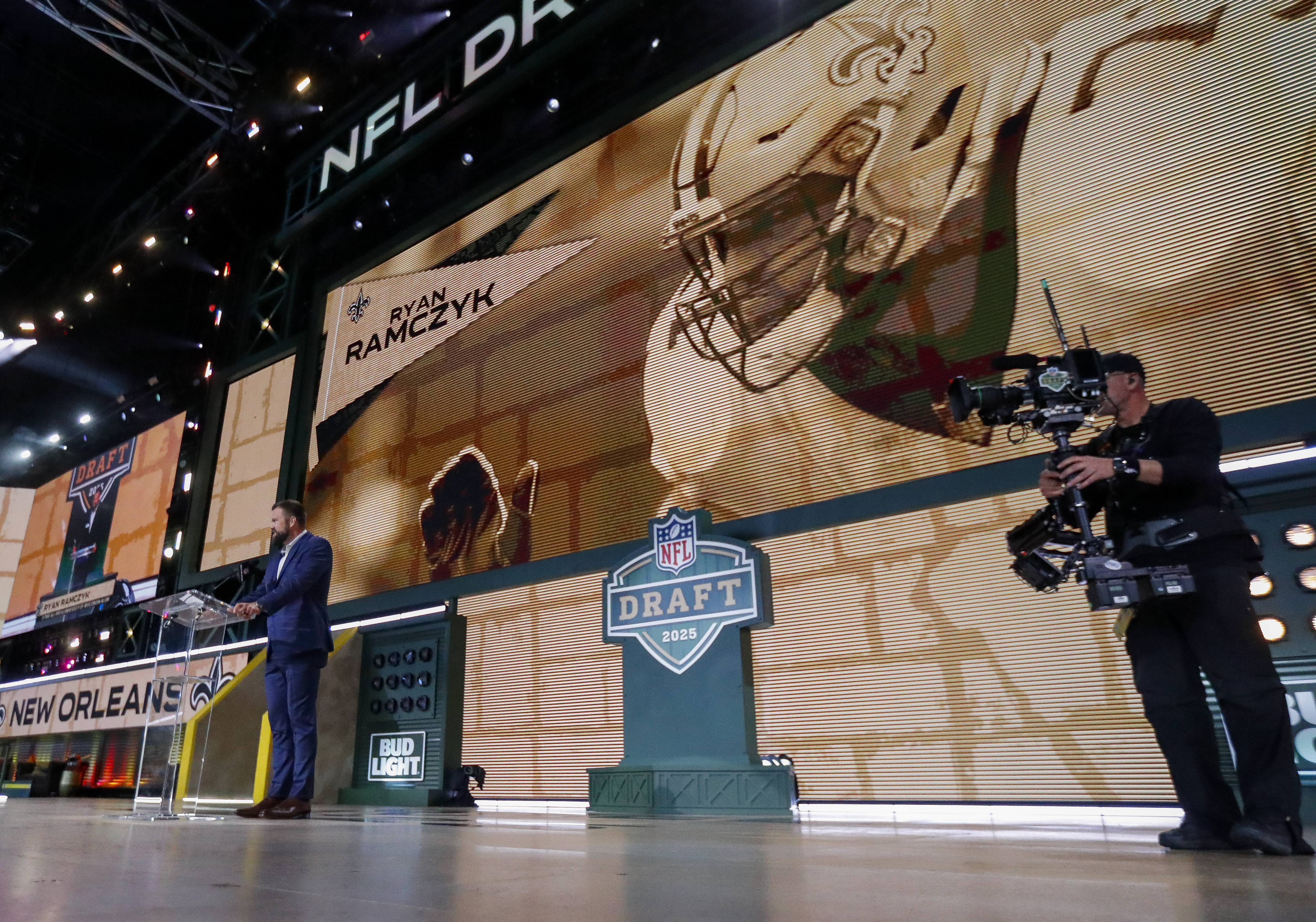 Former New Orleans Saints tackle Ryan Ramczyk announces the team’s selection with the 40th overall pick during the 2025 NFL Draft at Lambeau Field.