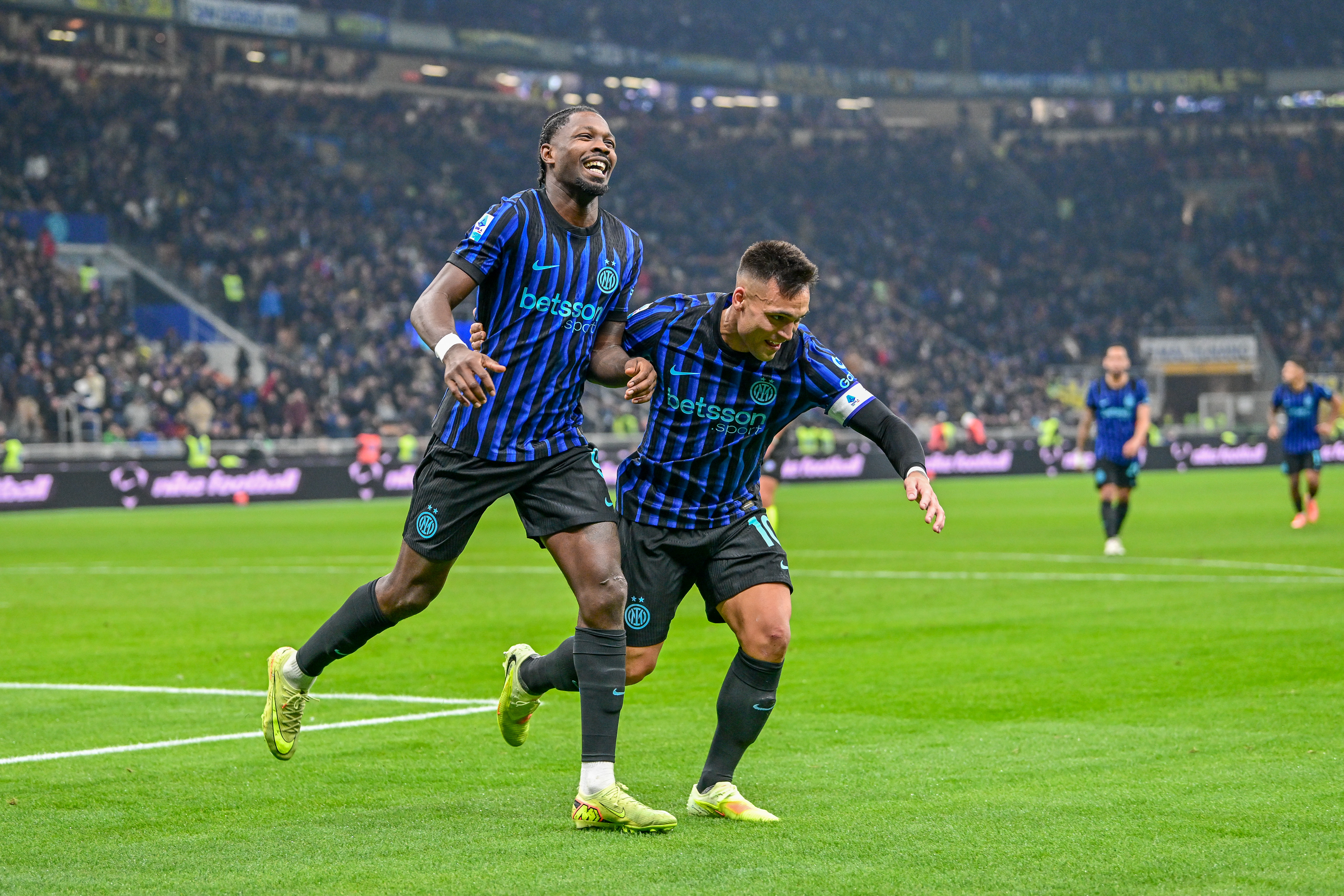Marcus Thuram and Lautaro Martinez celebrate a goal as we provide our Inter Milan vs. Liverpool prediction today. 
