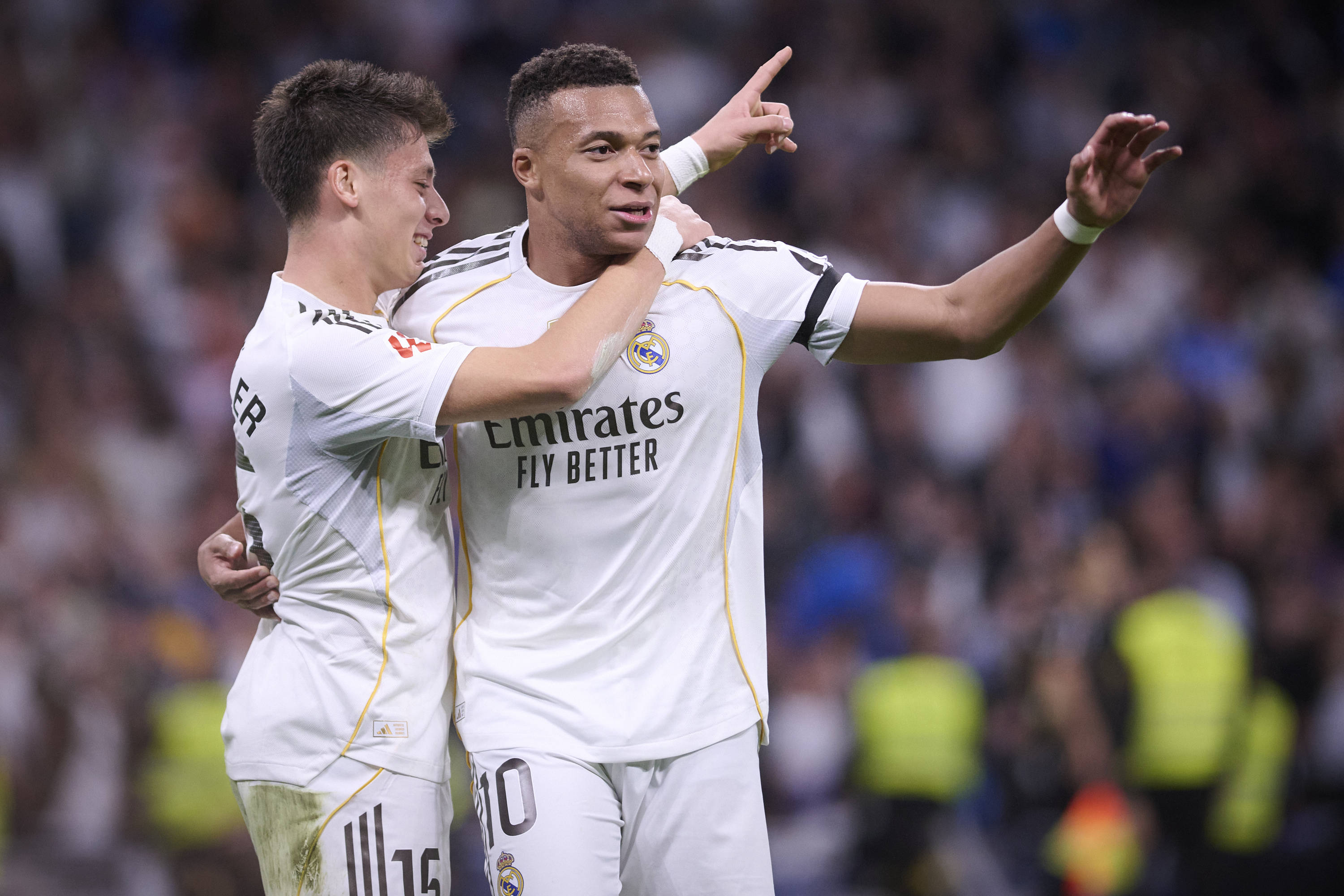  Real Madrid's Kylian Mbappe (right) and Arda Guler celebrate a goal as we offer our Liverpool vs. Real Madrid prediction today