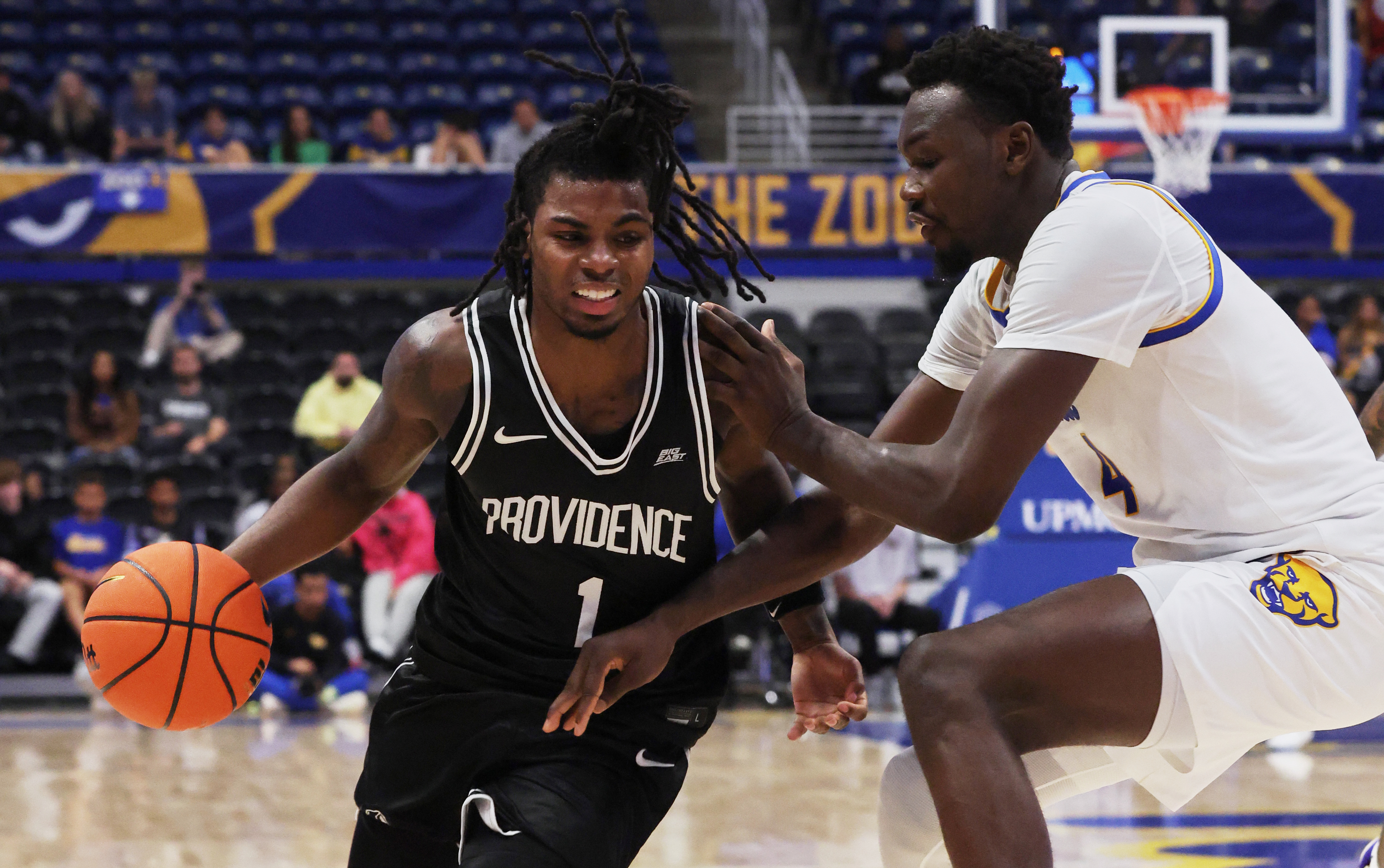 Providence guard Jason Edwards (1) drives to the basket as we provide our college basketball best bets and player props today
