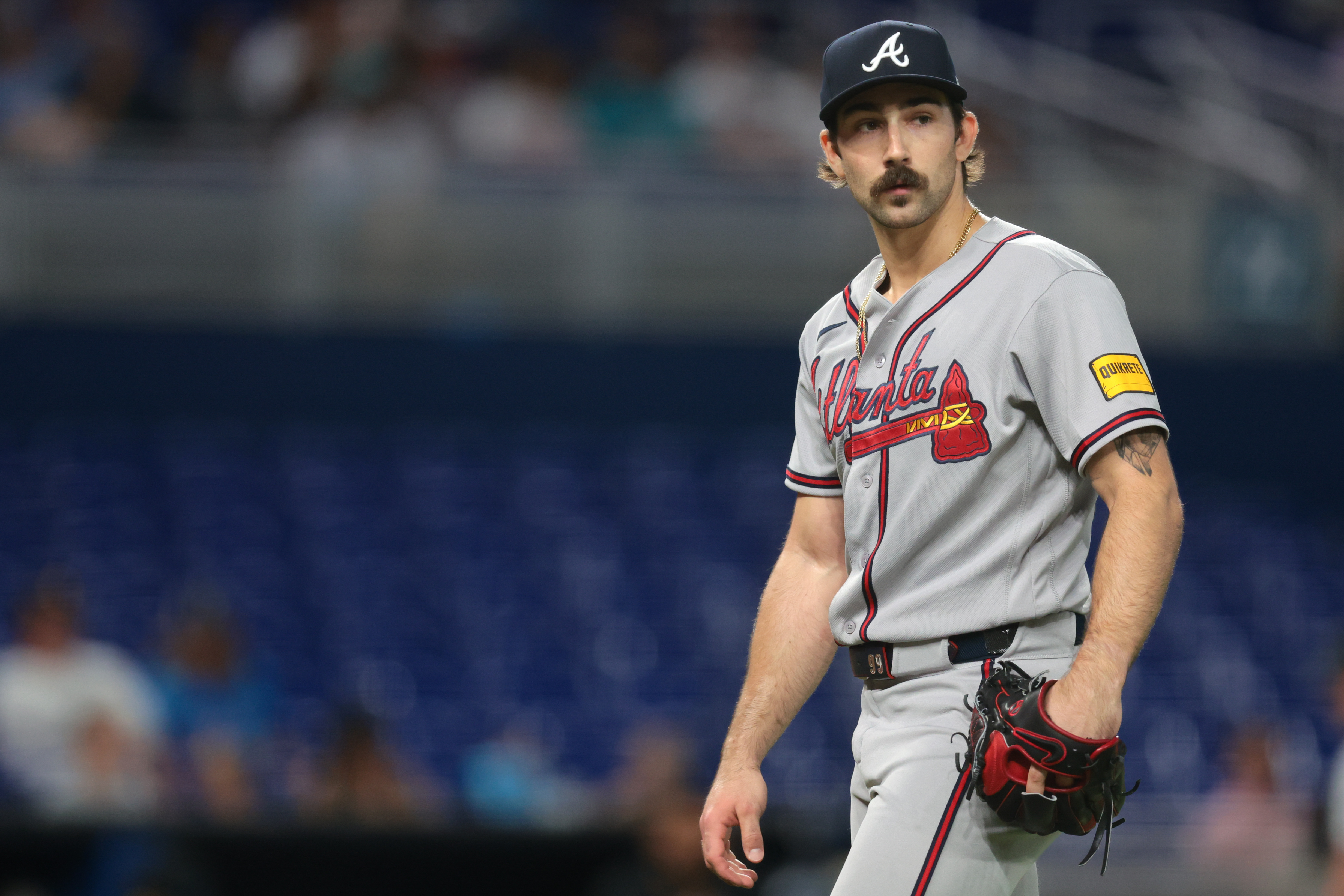 Atlanta Braves starting pitcher Spencer Strider (99) returns to the dugout as we break down our Braves vs Red Sox prediction.