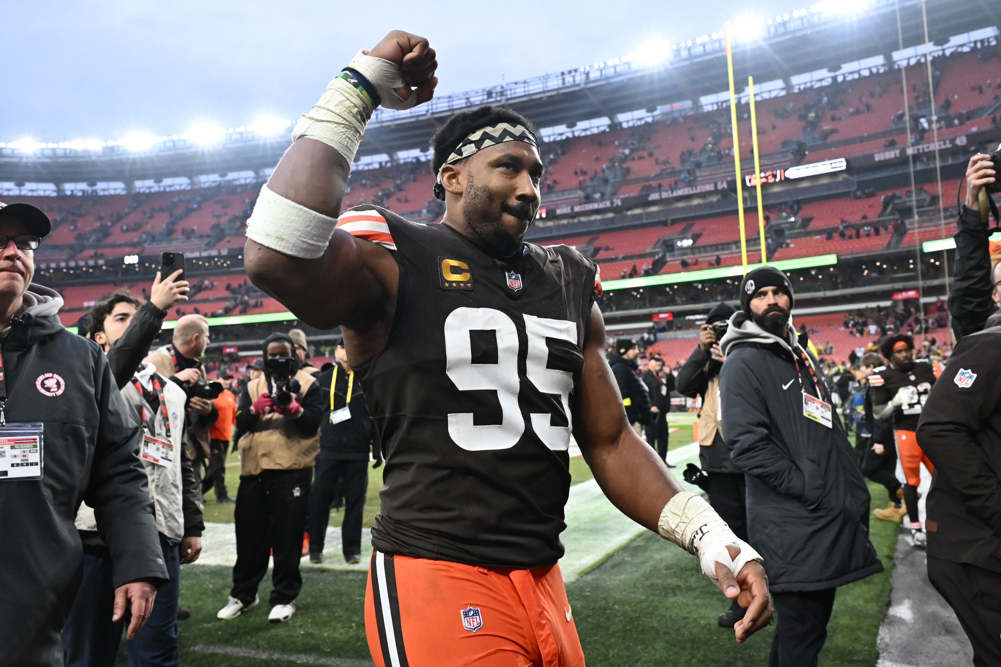 Cleveland Browns defensive end Myles Garrett (95) exits the field as we break down the NFL Defensive Player of the Year odds.