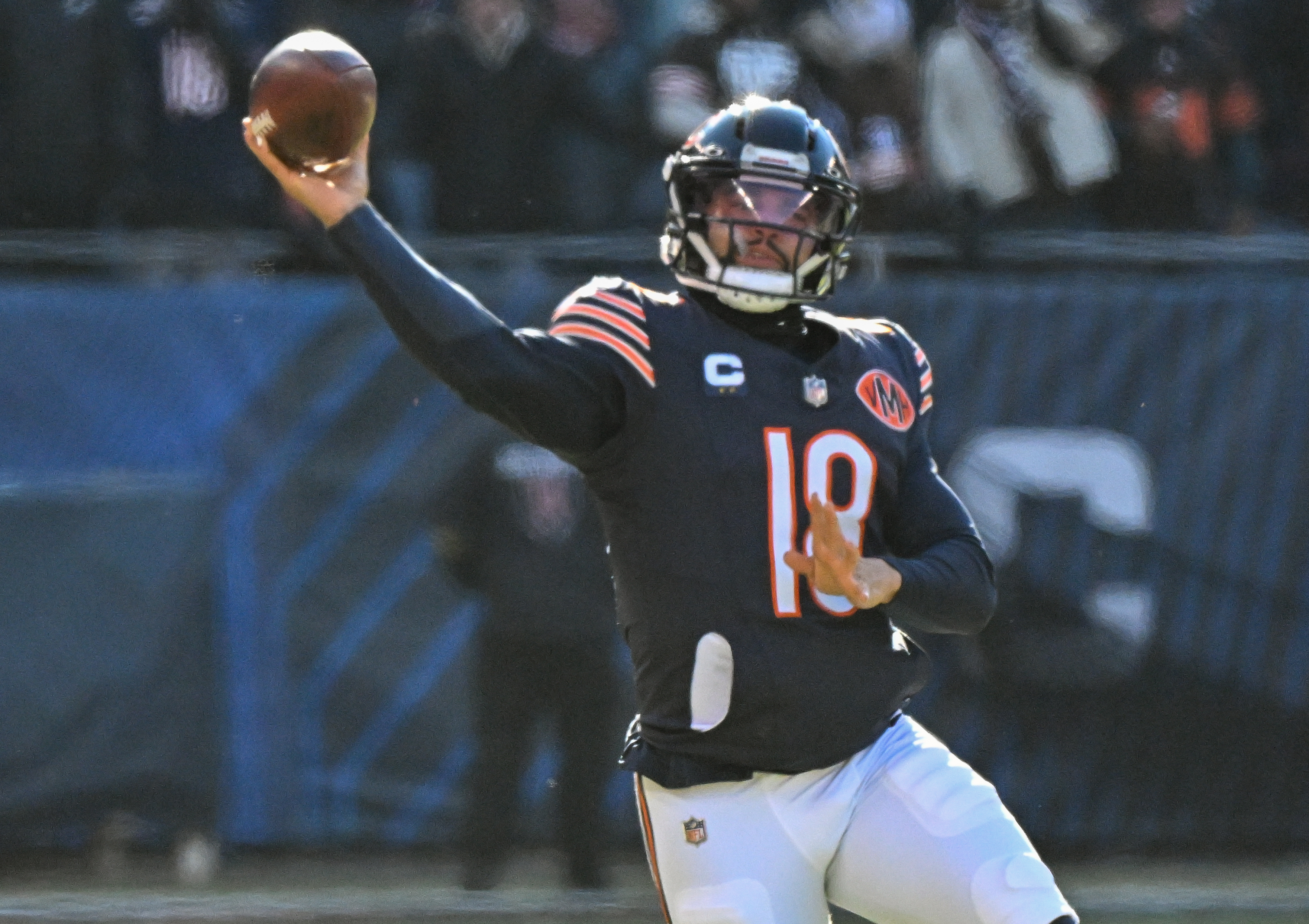 Chicago Bears quarterback Caleb Williams (18) throws a pass as he is featured in our Bears vs. 49ers predictions.