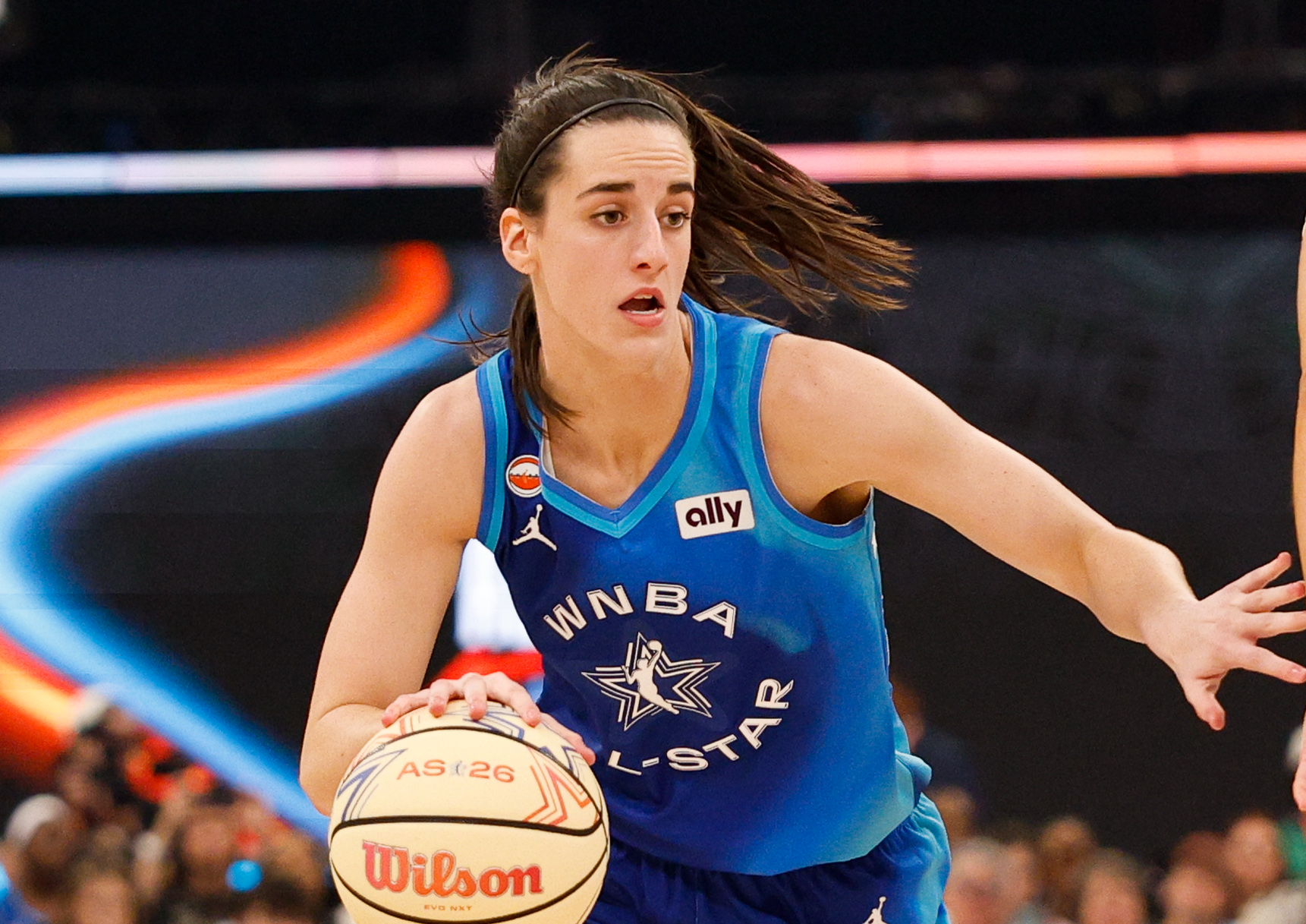 Pictured: Caitlin Clark dribbling with the basketball. Photo Kamil Krzaczynski-Imagn Images. 