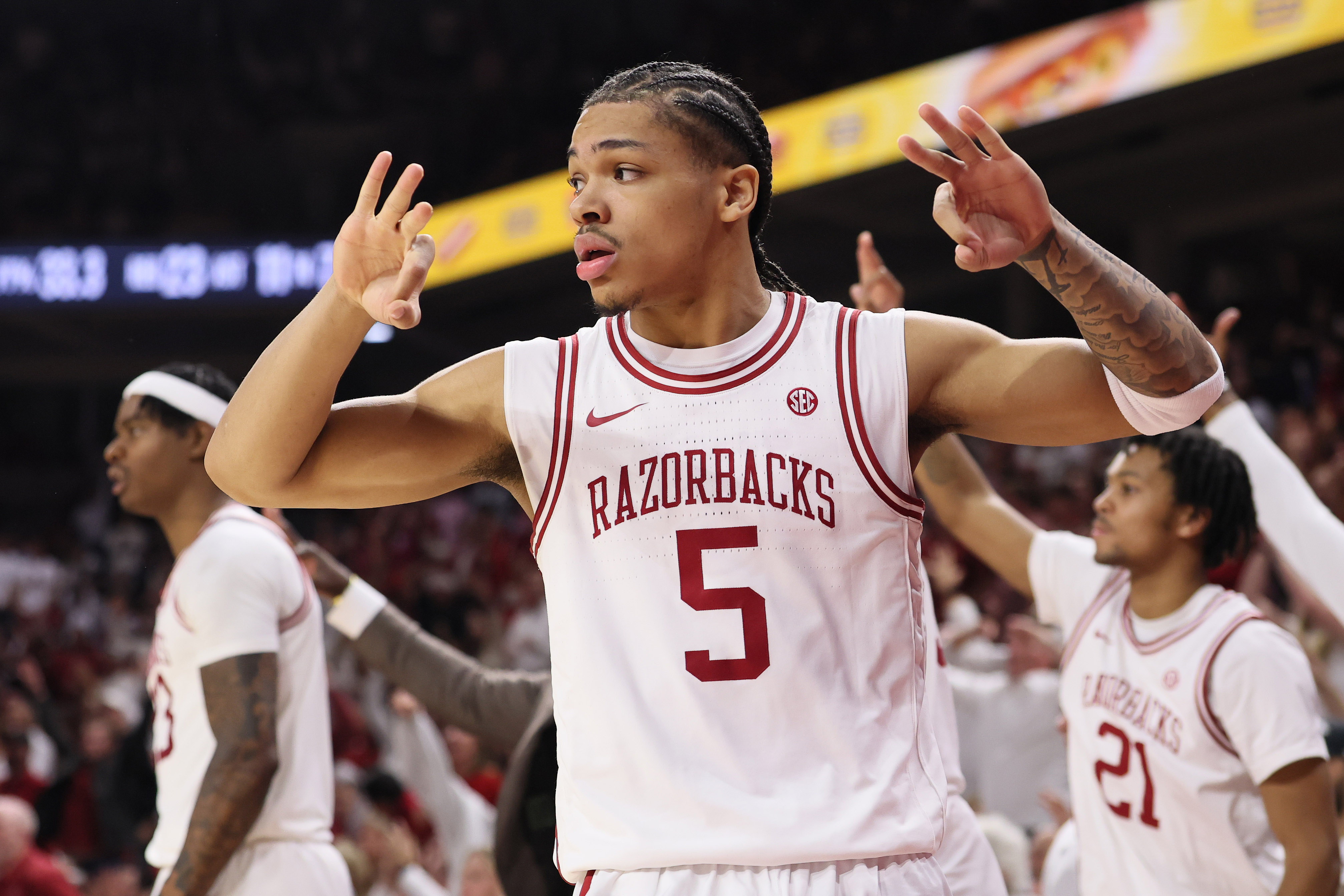 Arkansas Razorbacks guard Darius Acuff Jr. (5), seen here reacting to a 3-pointer, is featured in our Hawaii vs. Arkansas prediction today.