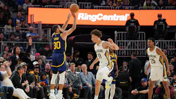 Stephen Curry of the Golden State Warriors attempts a 3-point jump shot in the fourth quarter against Dyson Daniels of the New Orleans Pelicans. We're backing Curry in our Warriors vs. Kings player props.
