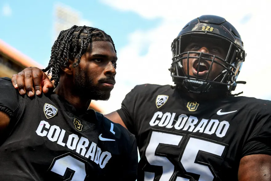 Center Van Wells and quarterback Shedeur Sanders of the Colorado Buffaloes celebrate after a play in the fourth quarter against the Nebraska Cornhuskers, and we offer new U.S. bettors our exclusive Caesars promo code.