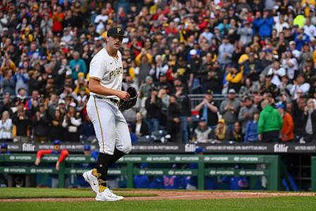 Paul Skenes of the Pittsburgh Pirates walks off the field against the Chicago Cubs, and we offer our top MLB player props and expert picks based on the best MLB odds.
