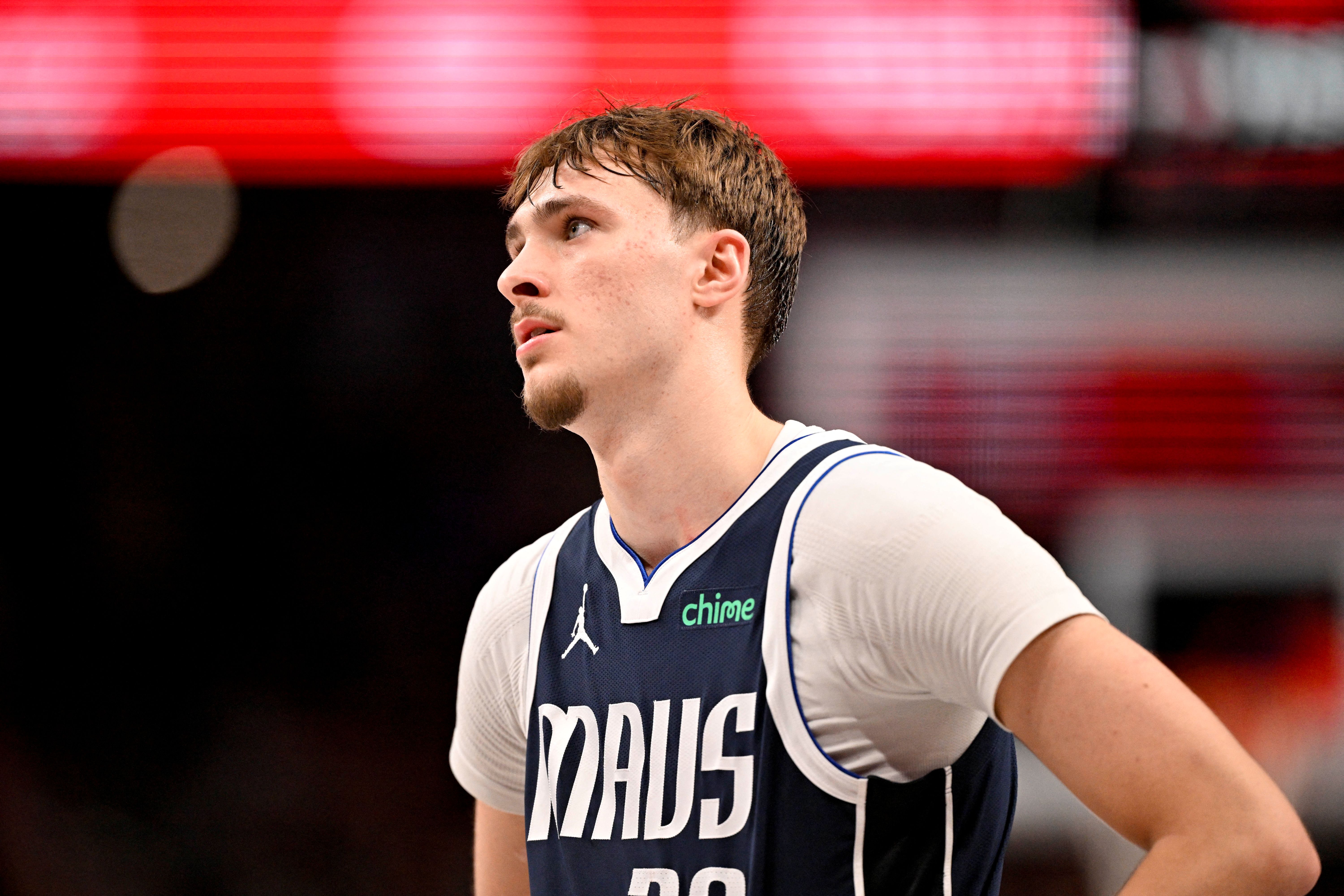 Dallas Mavericks forward Cooper Flagg (32), seen here looking on during a game, is featured in our NBA Rookie of the Year odds.