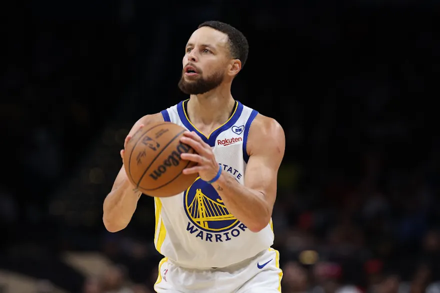 Stephen Curry of the Golden State Warriors shoots against the Washington Wizards at Capital One Arena as we look at our Warriors-Knicks promo code for BetRivers.
