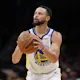 Stephen Curry of the Golden State Warriors shoots against the Washington Wizards at Capital One Arena as we look at our Warriors-Knicks promo code for BetRivers.