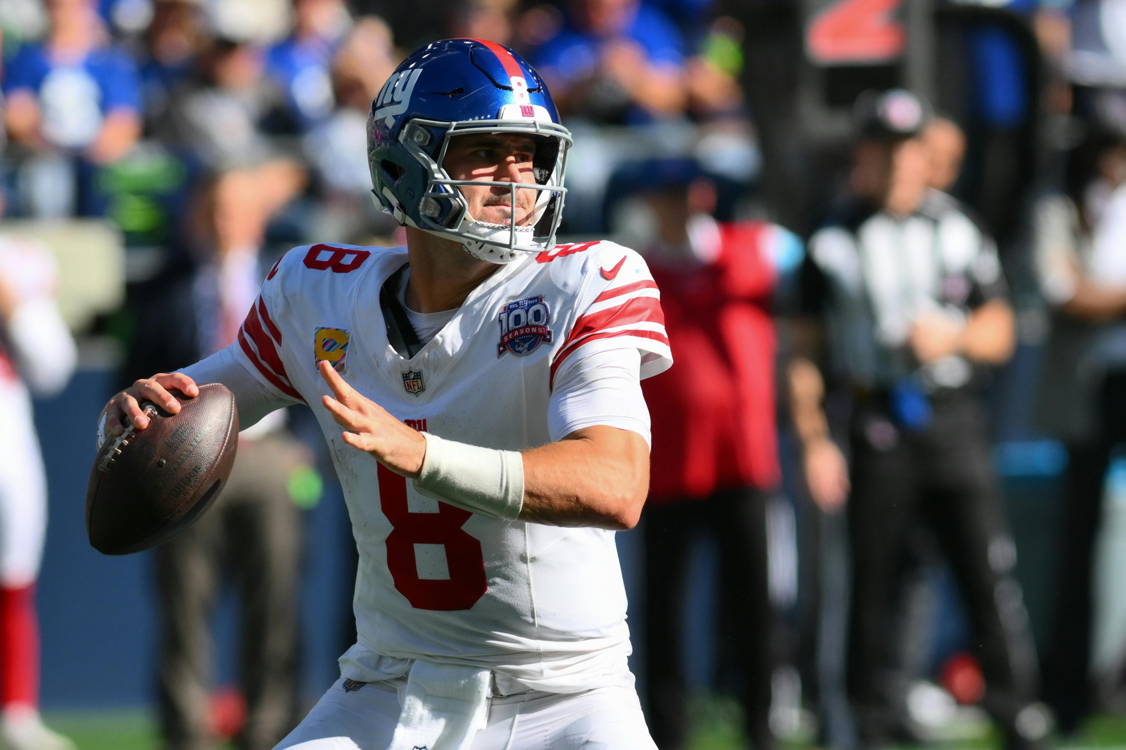 New York Giants quarterback Daniel Jones passes the ball as we offer our NFL Week 10 predictions.