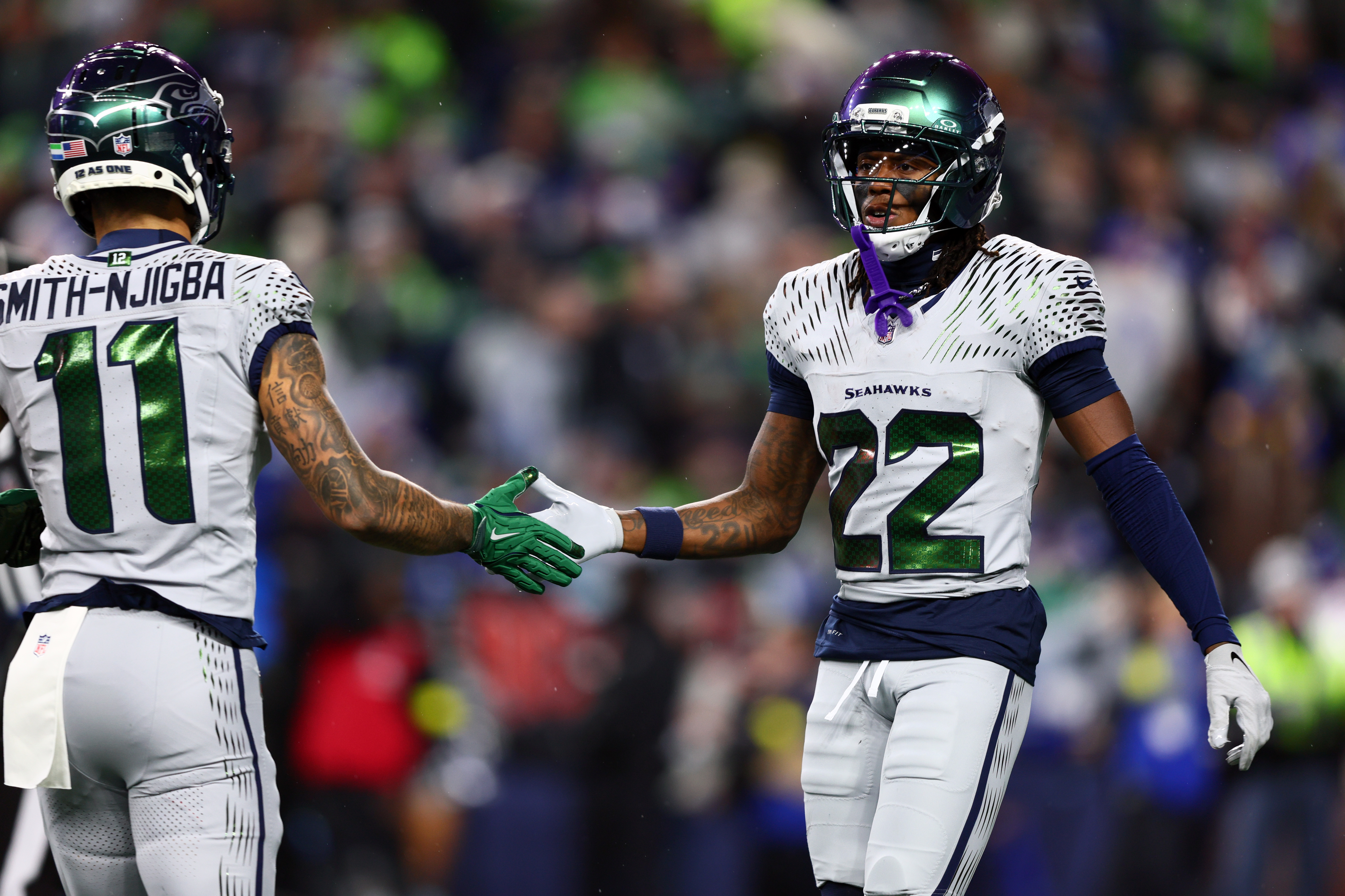 Seattle Seahawks wide receiver Rashid Shaheed (22) reacts with wide receiver Jaxon Smith-Njigba (11), who are both featured in our Super Bowl MVP predictions.