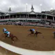 Mage, ridden by jockey Javier Castellano leads the field to the finish line during the 149th running of the Kentucky Derby as we look at Circa Sportsbook and its retail plans at Kentucky Downs.