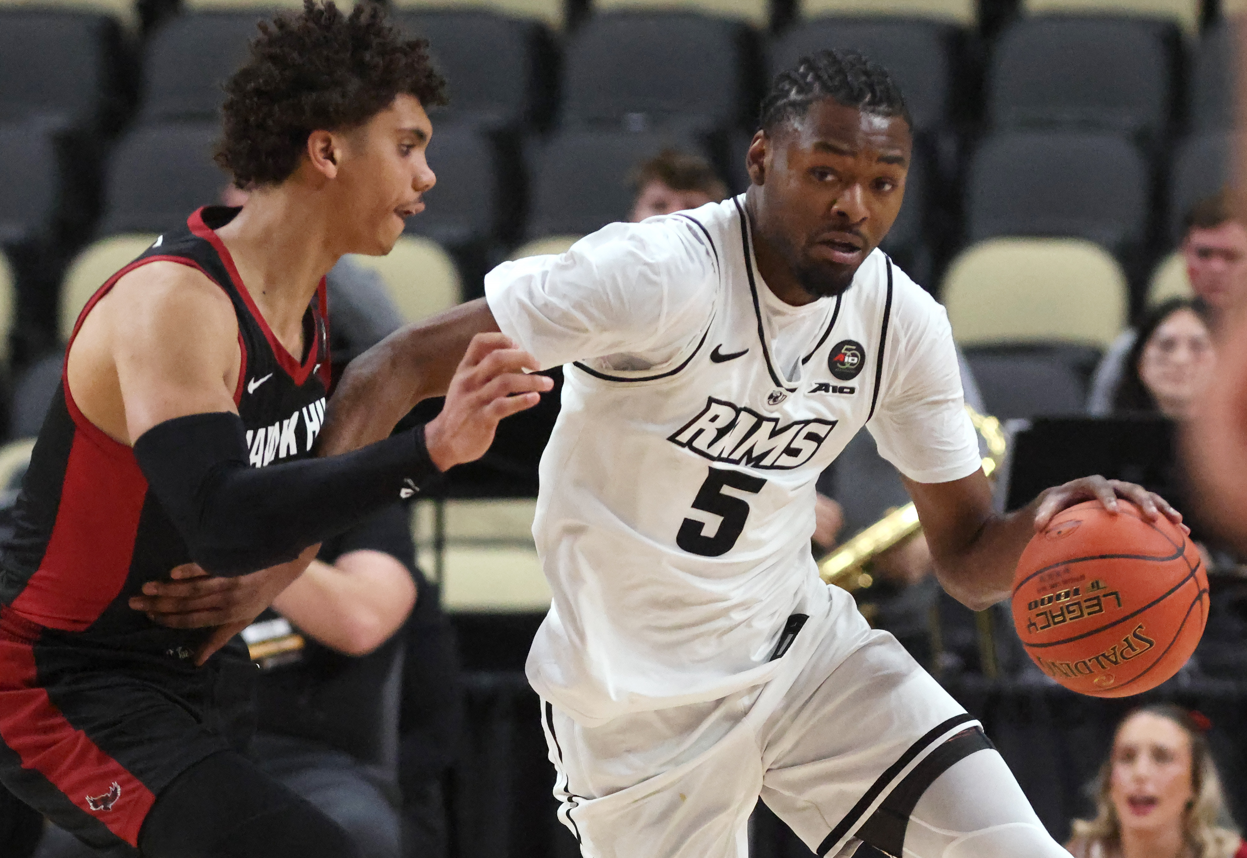 VCU Rams forward Barry Evans brings the ball up court up as we offer our best Dayton vs. VCU prediction for the A10 Championship.