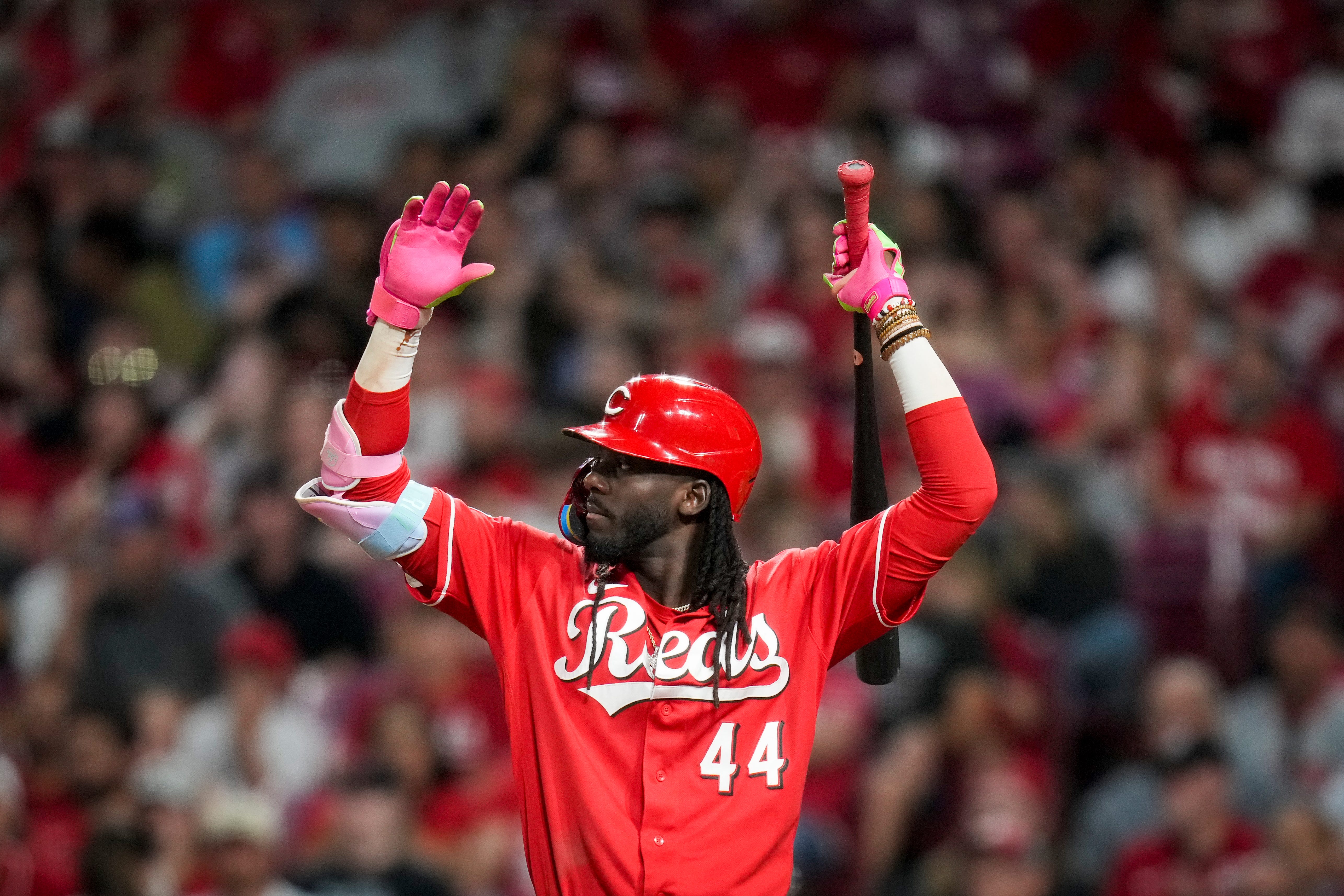 Elly de la Cruz - who's featured in my Rockies vs. Reds prediction - stretches between pitches in the eighth inning.