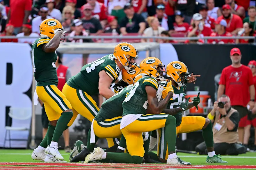 The Green Bay Packers celebrate in the end zone after a turnover against the Tampa Bay Buccaneers during the second quarter in the game. Julio Aguilar/Getty Images/AFP.