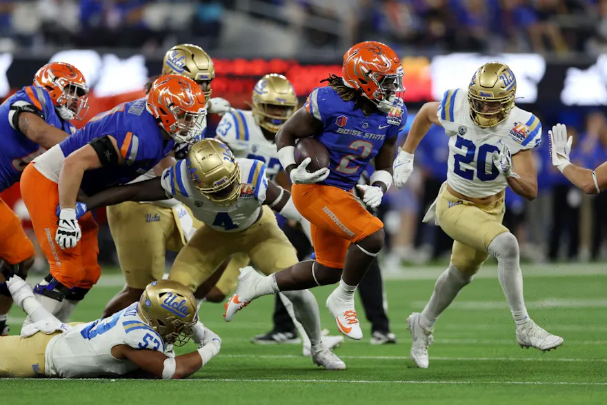 Ashton Jeanty of the Boise State Broncos runs the ball against the UCLA Bruins in the third quarter during the LA Bowl Hosted by Gronk. Boise State is expected to open as the favorite by the 2024 Mountain West Championship Odds. 