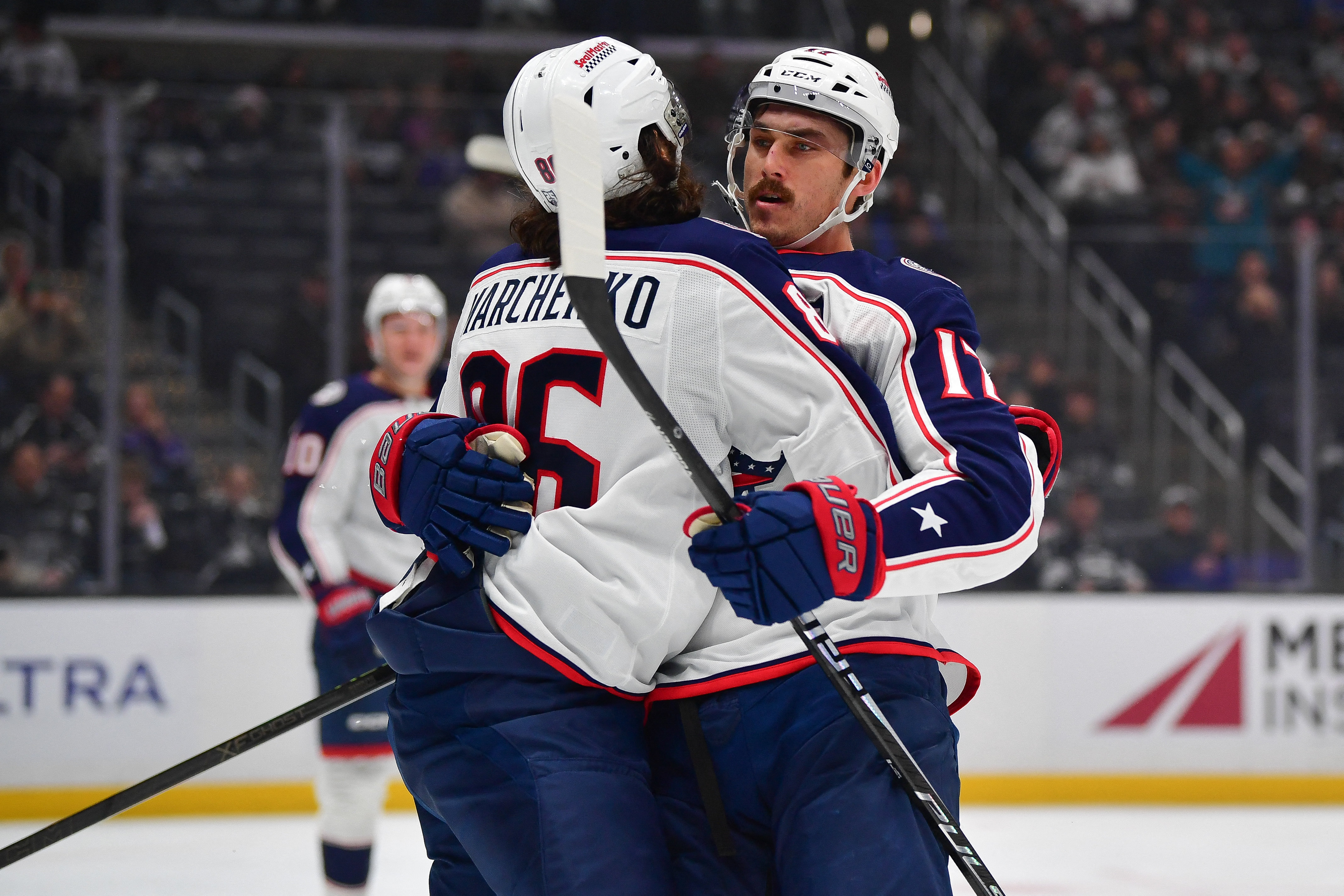 Columbus Blue Jackets left wing Mason Marchment (17) celebrates a goal with right wing Kirill Marchenko (86) as we break down our Blue Jackets vs. Rangers prediction tonight.