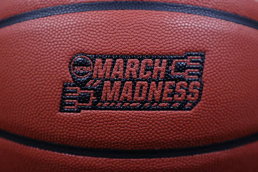 A close up view of a March Madness official game ball as we present our printable March Madness bracket.