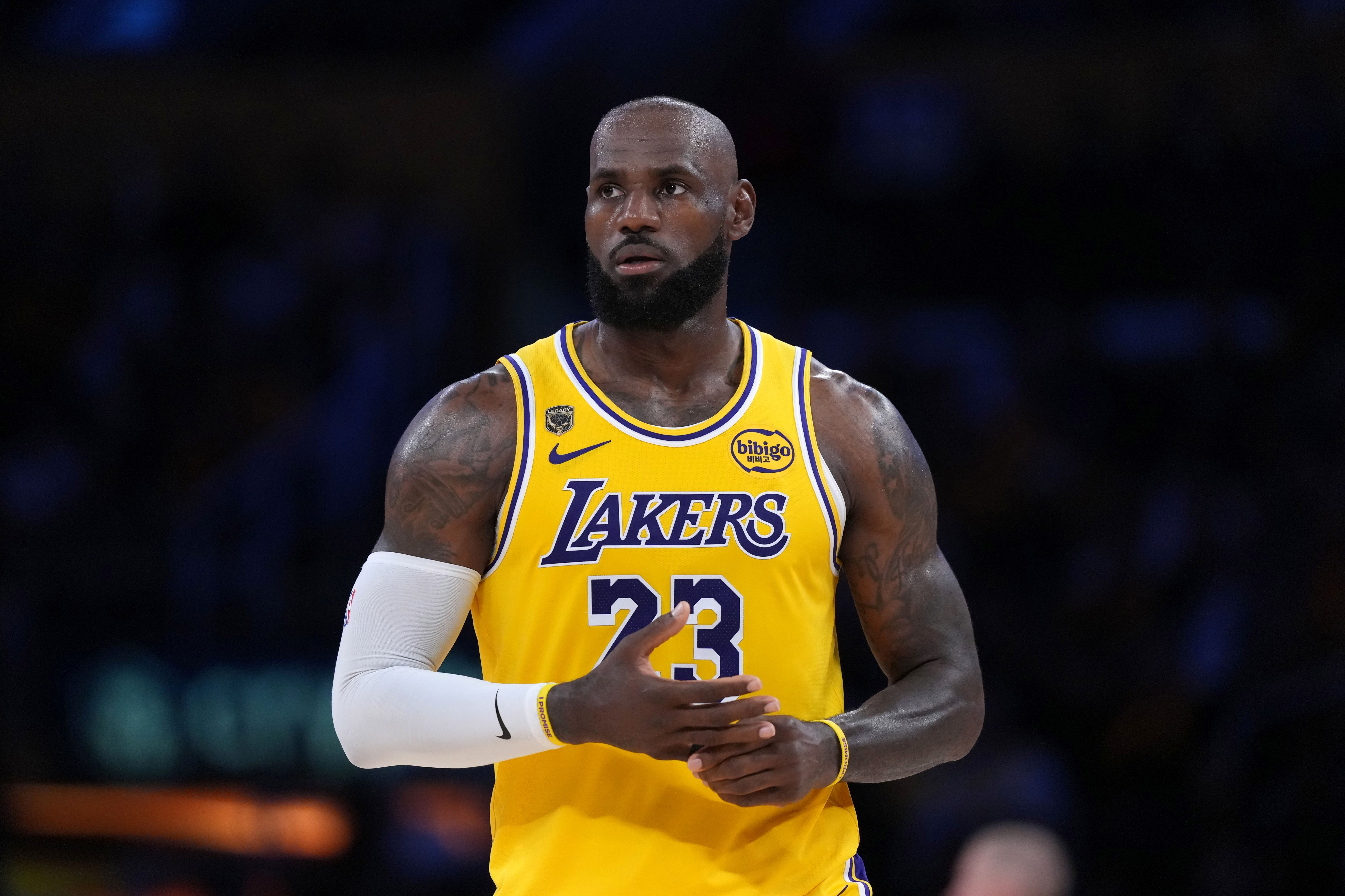 Los Angeles Lakers forward LeBron James (23), seen here looking on during a game, is featured in our Lakers vs. Rockets player props for Game 3 today.