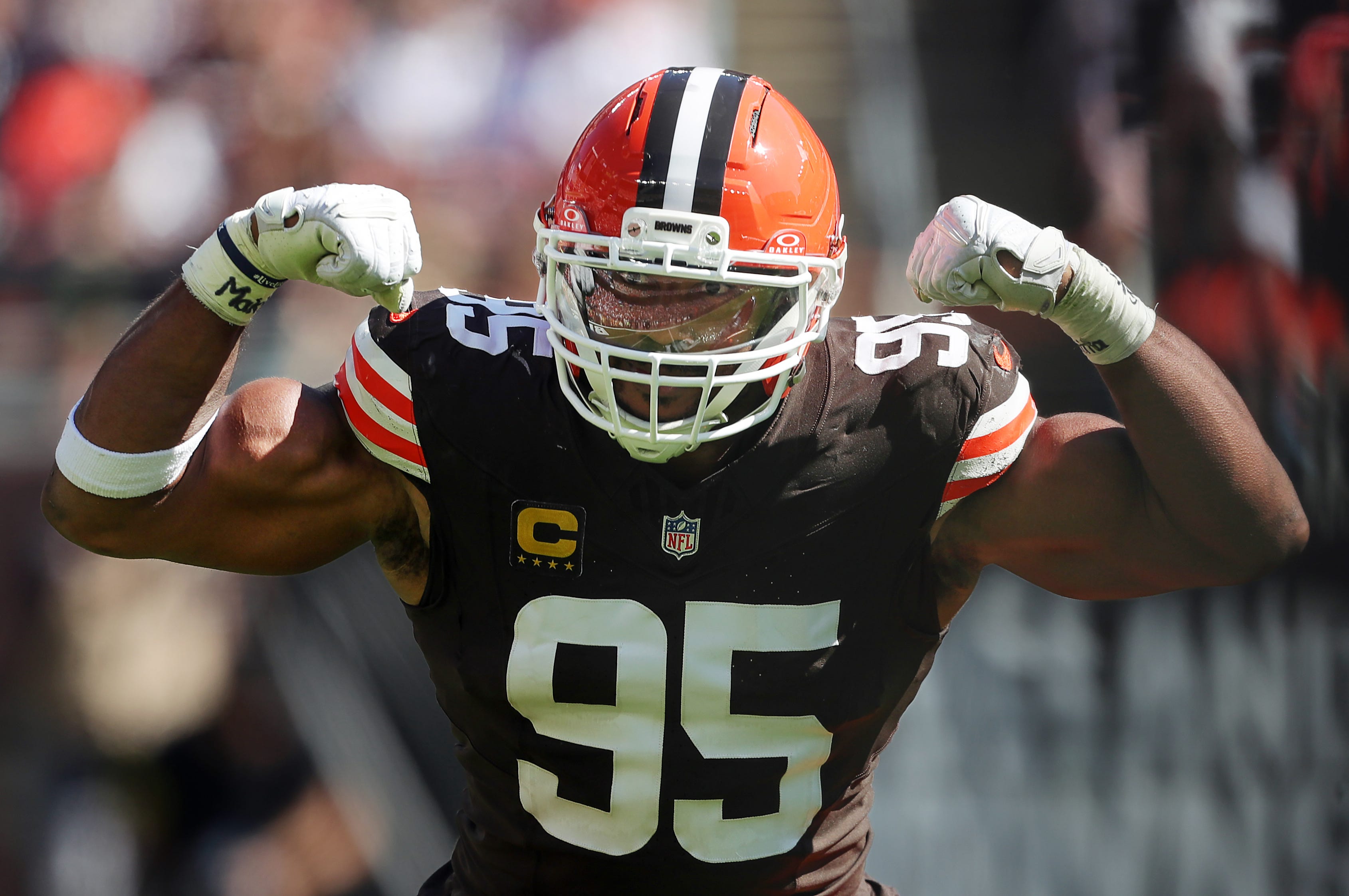 Myles Garrett (95) celebrates as he begins his chase for the NFL sack record after sacking Cincinnati Bengals quarterback Joe Burrow. 