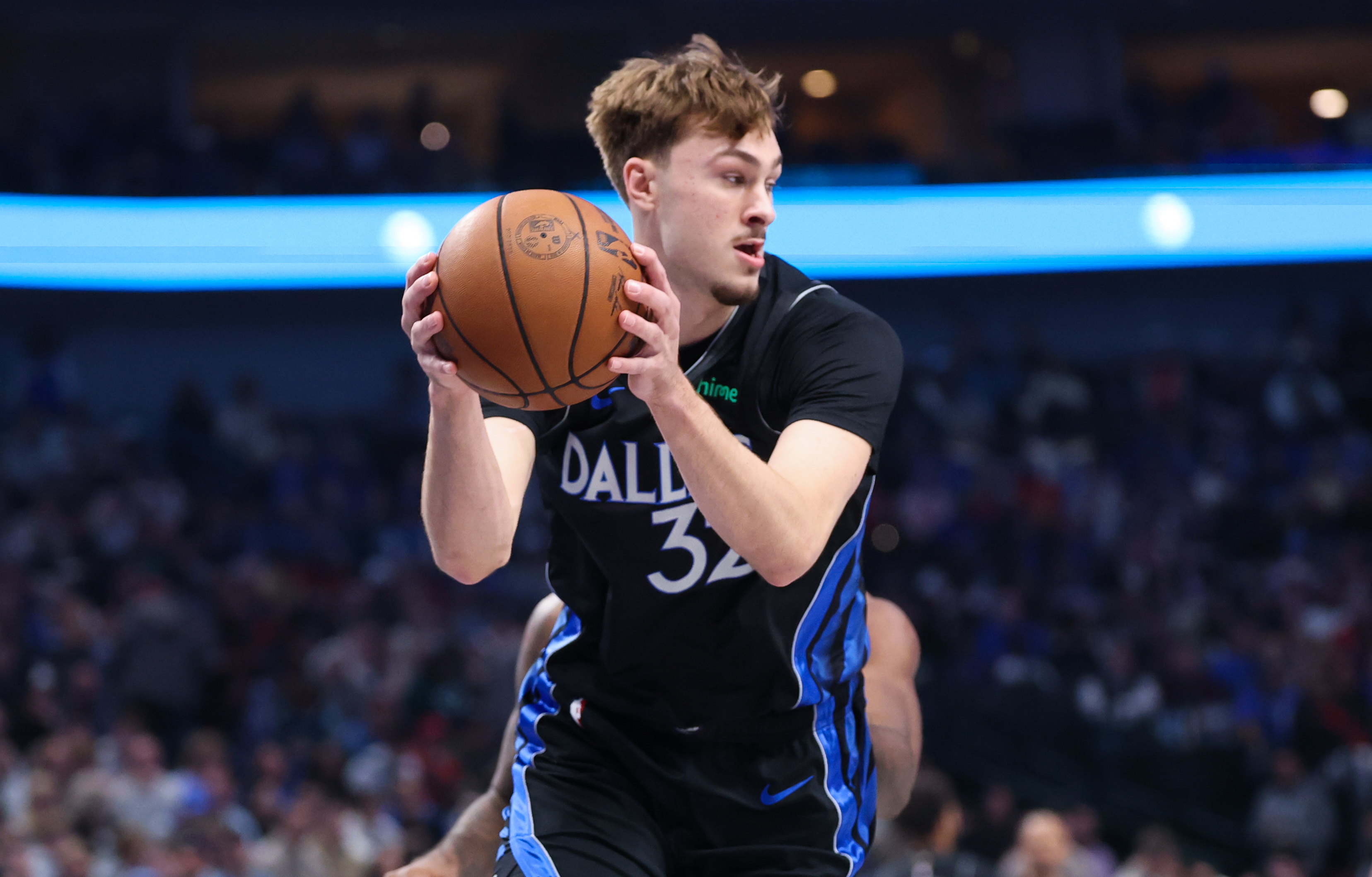 Dallas Mavericks forward Cooper Flagg (32), seen here controlling the ball, leads our Mavericks vs. Kings player props.