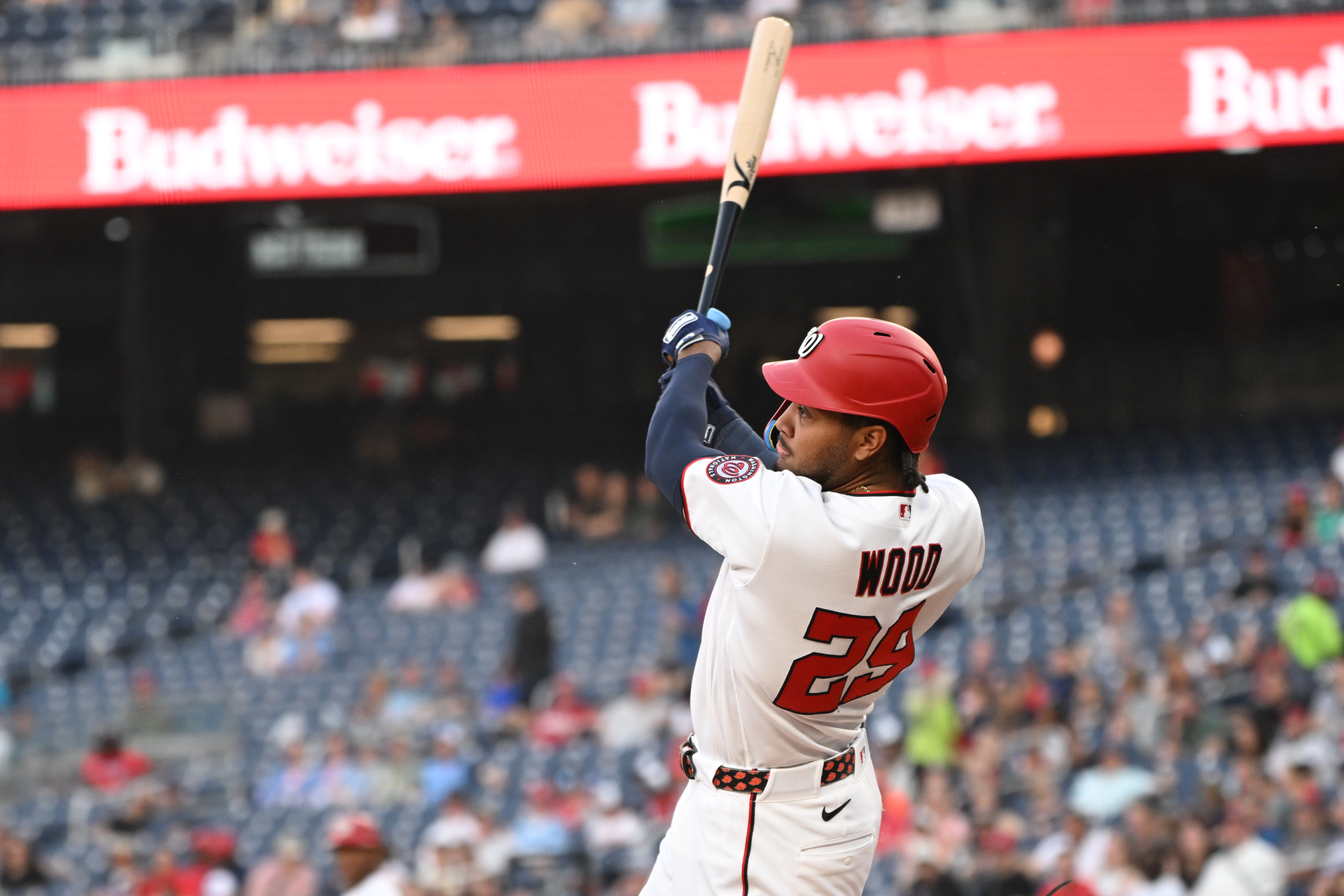 Washington Nationals left fielder James Wood (29) watches after hitting the ball into play as we break down our Twins vs Nationals win probability.
