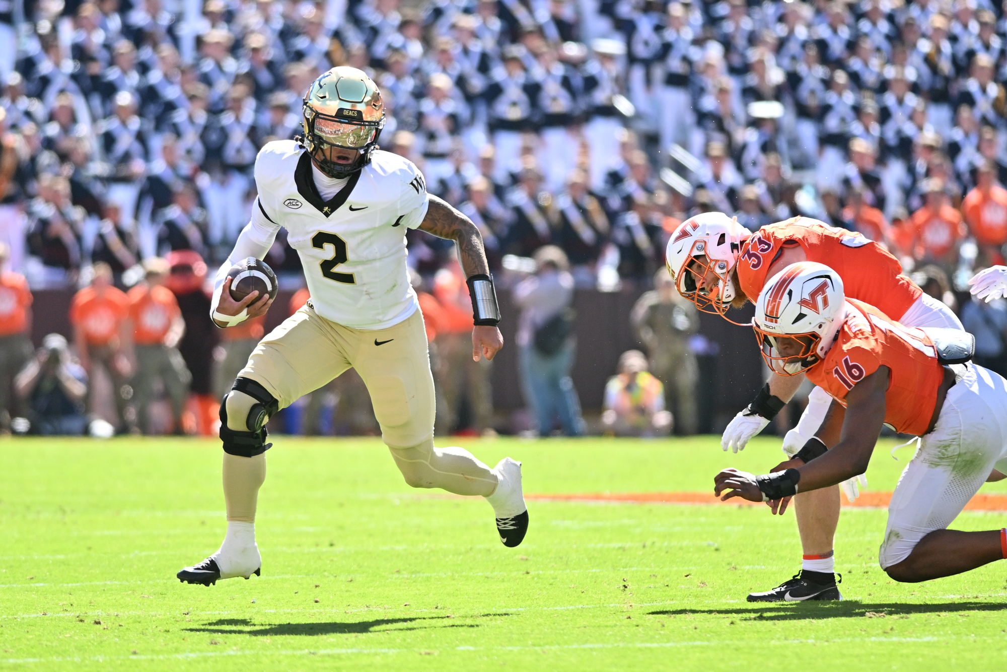 Wake Forest Demon Deacons quarterback Robby Ashford (2) runs with the ball as we break down our Wake Forest vs. Mississippi State anytime touchdown scorer predictions.
