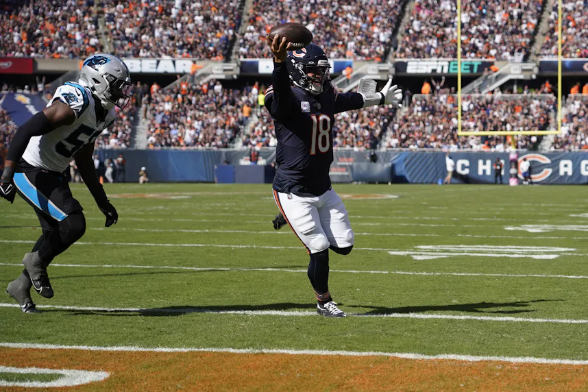 Chicago Bears quarterback Caleb Williams runs against the Carolina Panthers. We're backing Williams to have a big game in our Caleb Williams player prop bets.