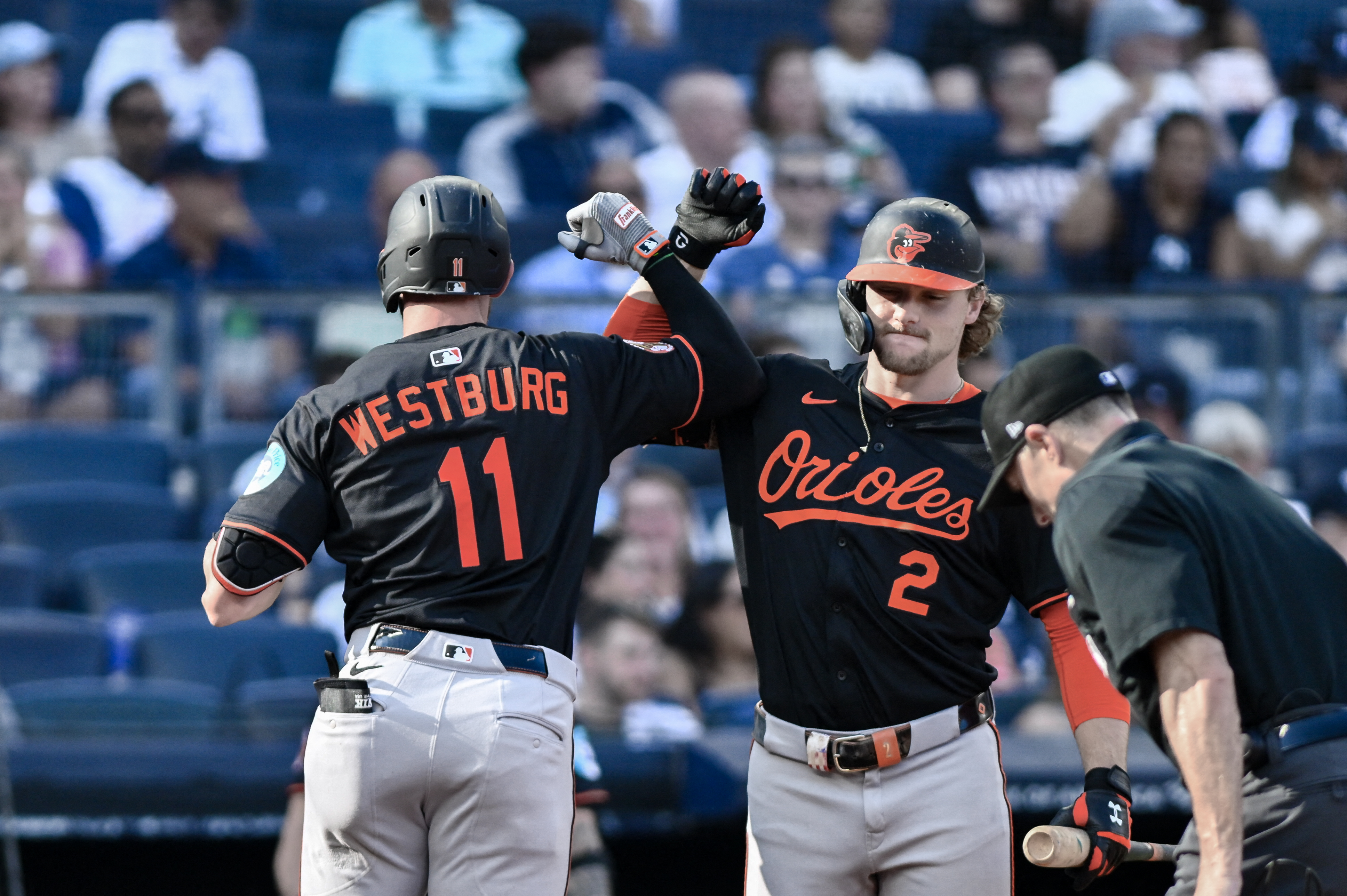 Baltimore Orioles third baseman Jordan Westburg and shortstop Gunnar Henderson celebrate, and their team highlights our MLB playoff odds and favorites 2026.