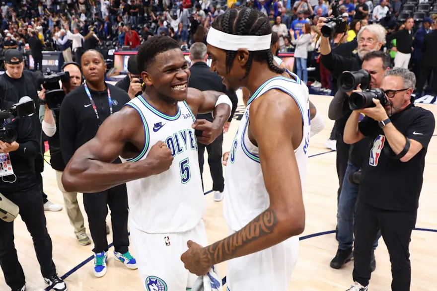Anthony Edwards and Jaden McDaniels of the Minnesota Timberwolves celebrate after winning Game 7  against the Denver Nuggets. We're backing Edwards and McDaniels in our Mavericks vs. Timberwolves Parlay. 