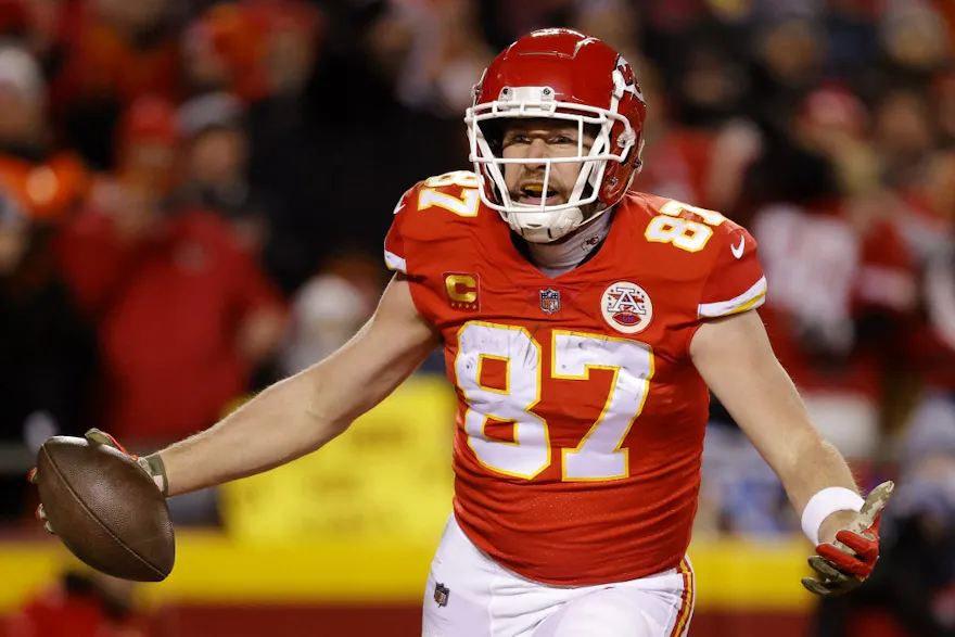 Travis Kelce of the Kansas City Chiefs celebrates after catching a pass for a touchdown against the Cincinnati Bengals during the second quarter in the AFC Championship Game at GEHA Field at Arrowhead Stadium on January 29, 2023 in Kansas City, Missouri.