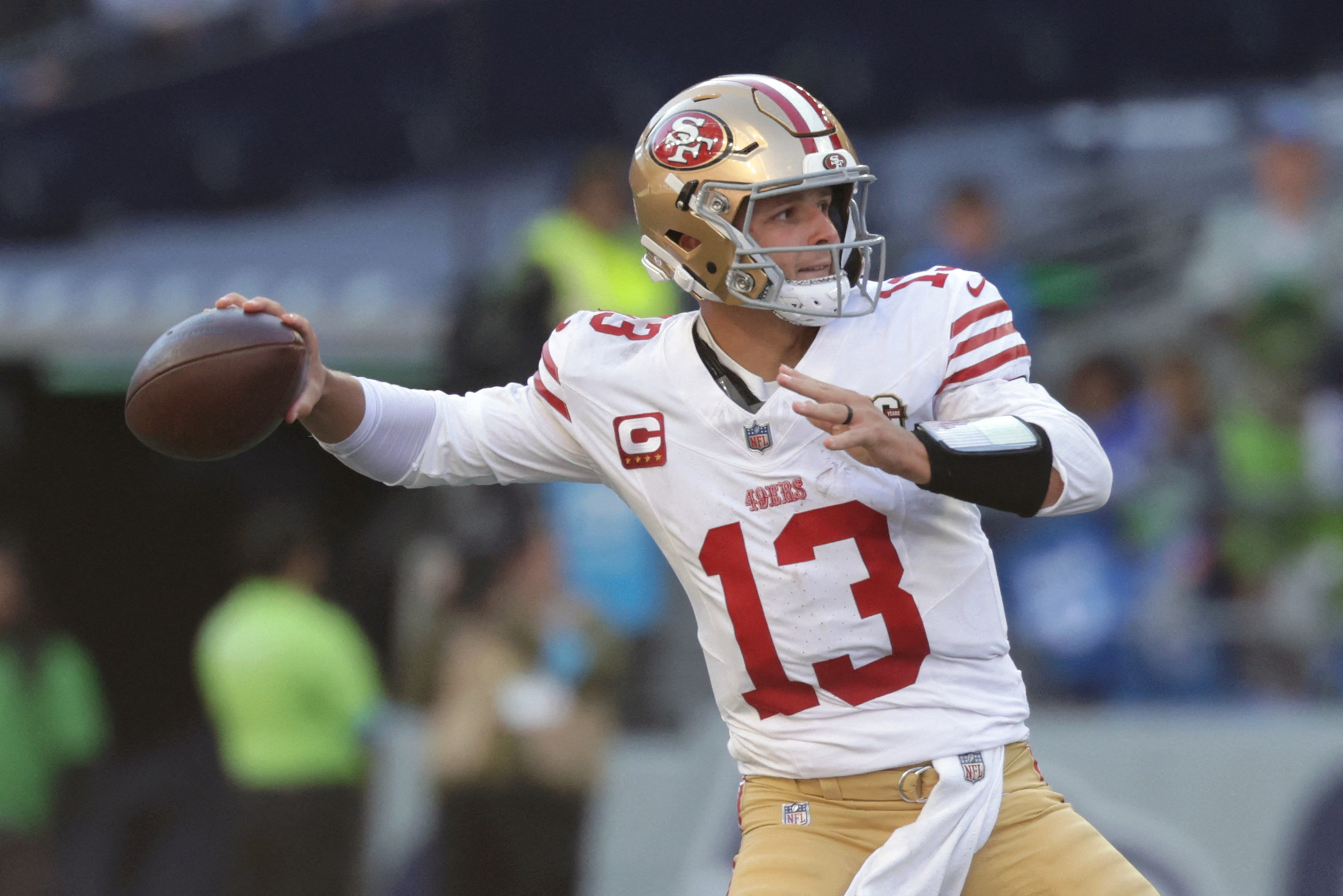 San Francisco 49ers quarterback Brock Purdy (13) drops back to pass against the Seattle Seahawks as we make our best Week 6 ATS predictions.