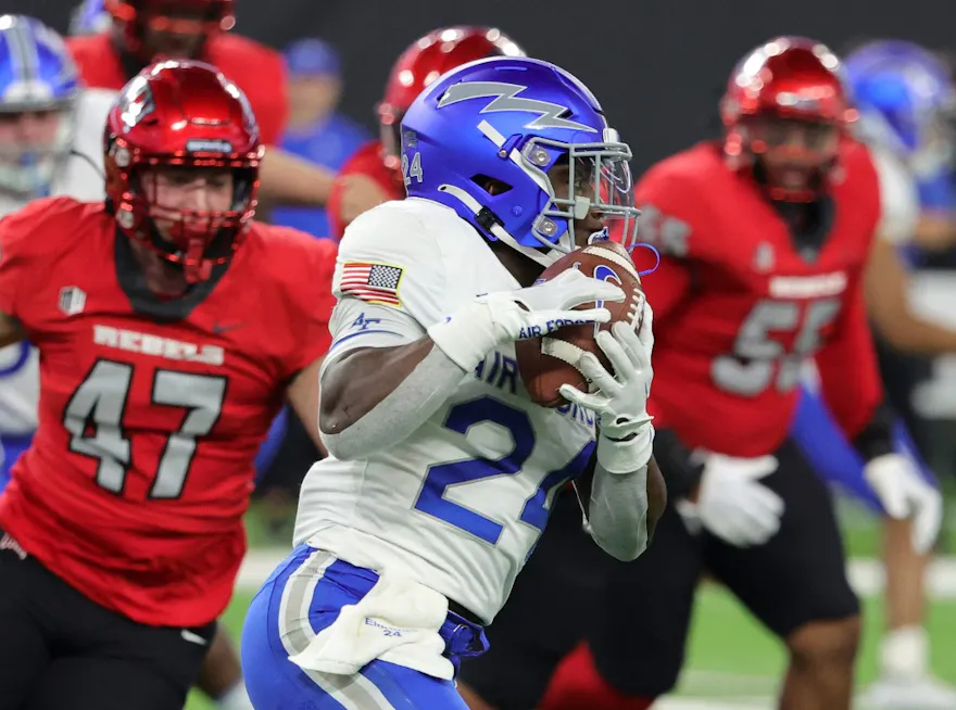 Running back John Lee Eldridge III runs the ball as the Air Force Falcons have become favorites to win the Mountain West Conference.